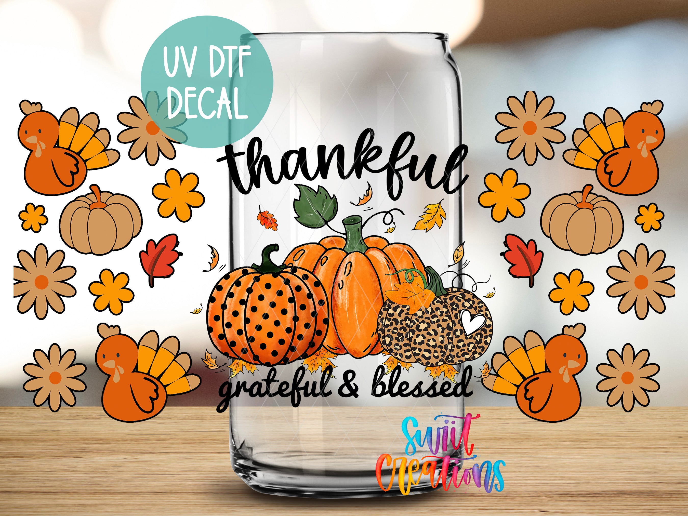 a glass jar with a Thanksgiving-themed decal, including a pumpkin, leopard print, and turkey. The decal also includes the text "UV Dtf DECAL" and "grateful & Blessed".