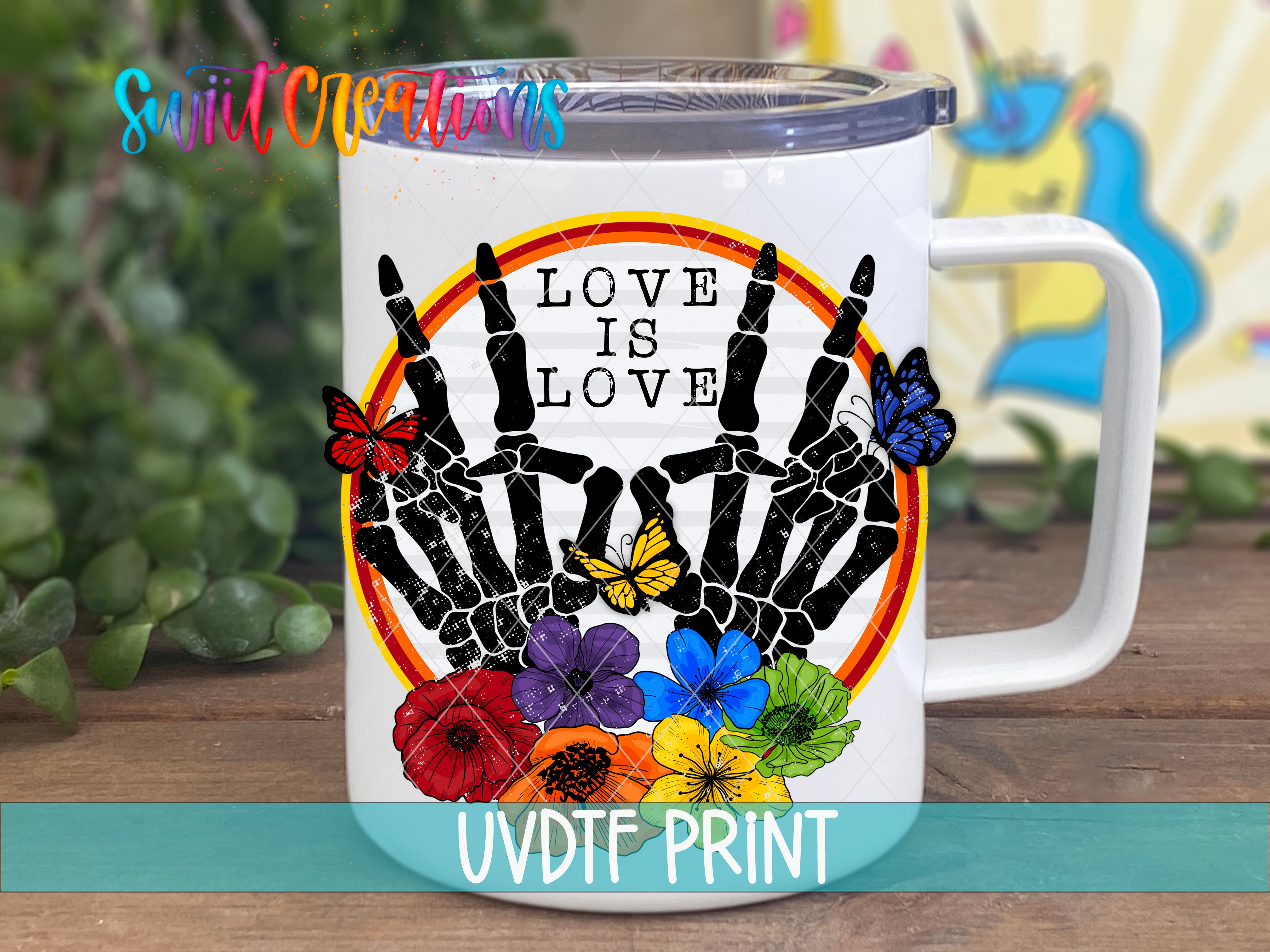 a white coffee mug with the words love is love on it