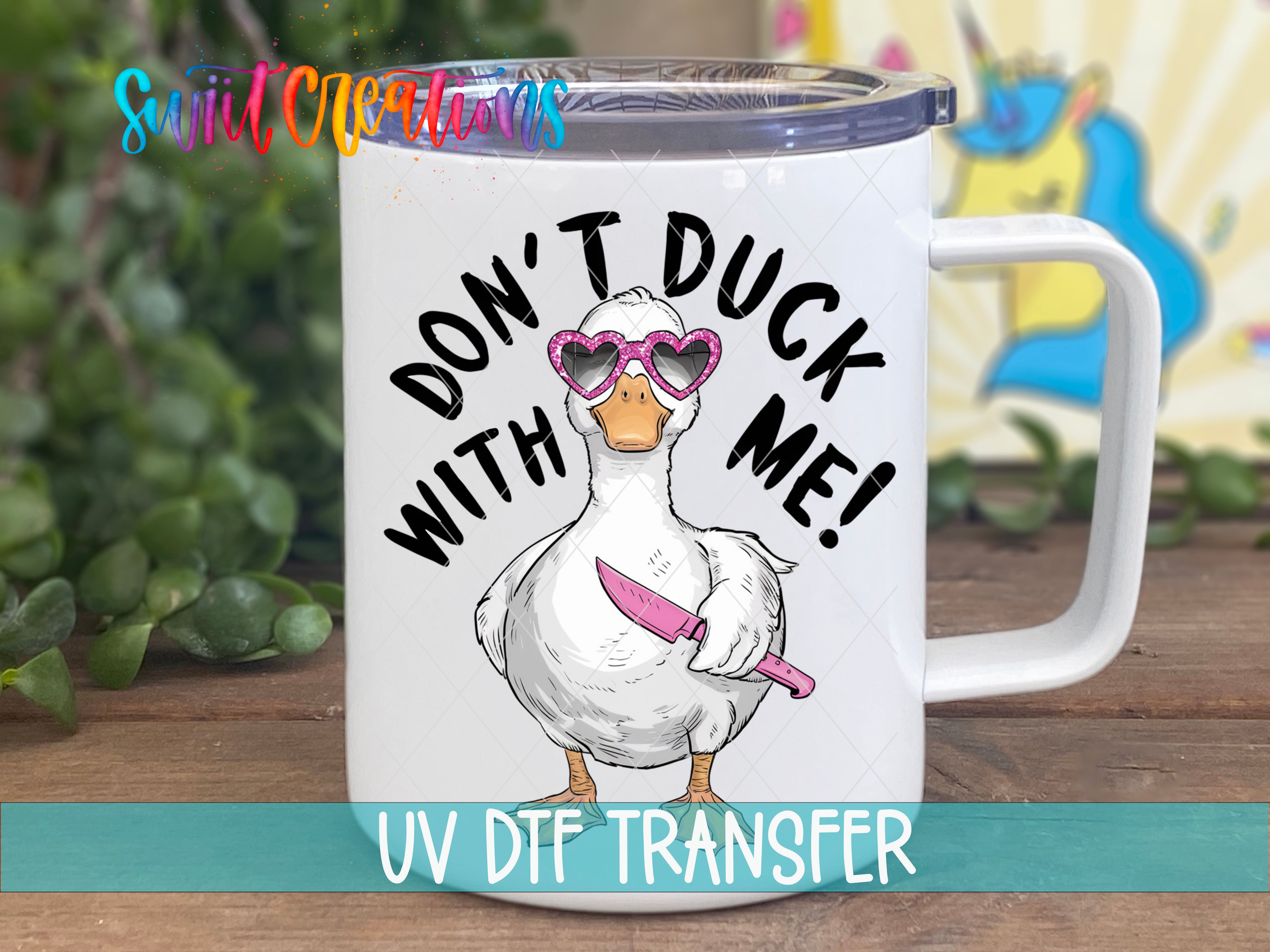 Swiit Creations UV DTF Don’t Duck With Me transfer displayed on a white coffee mug