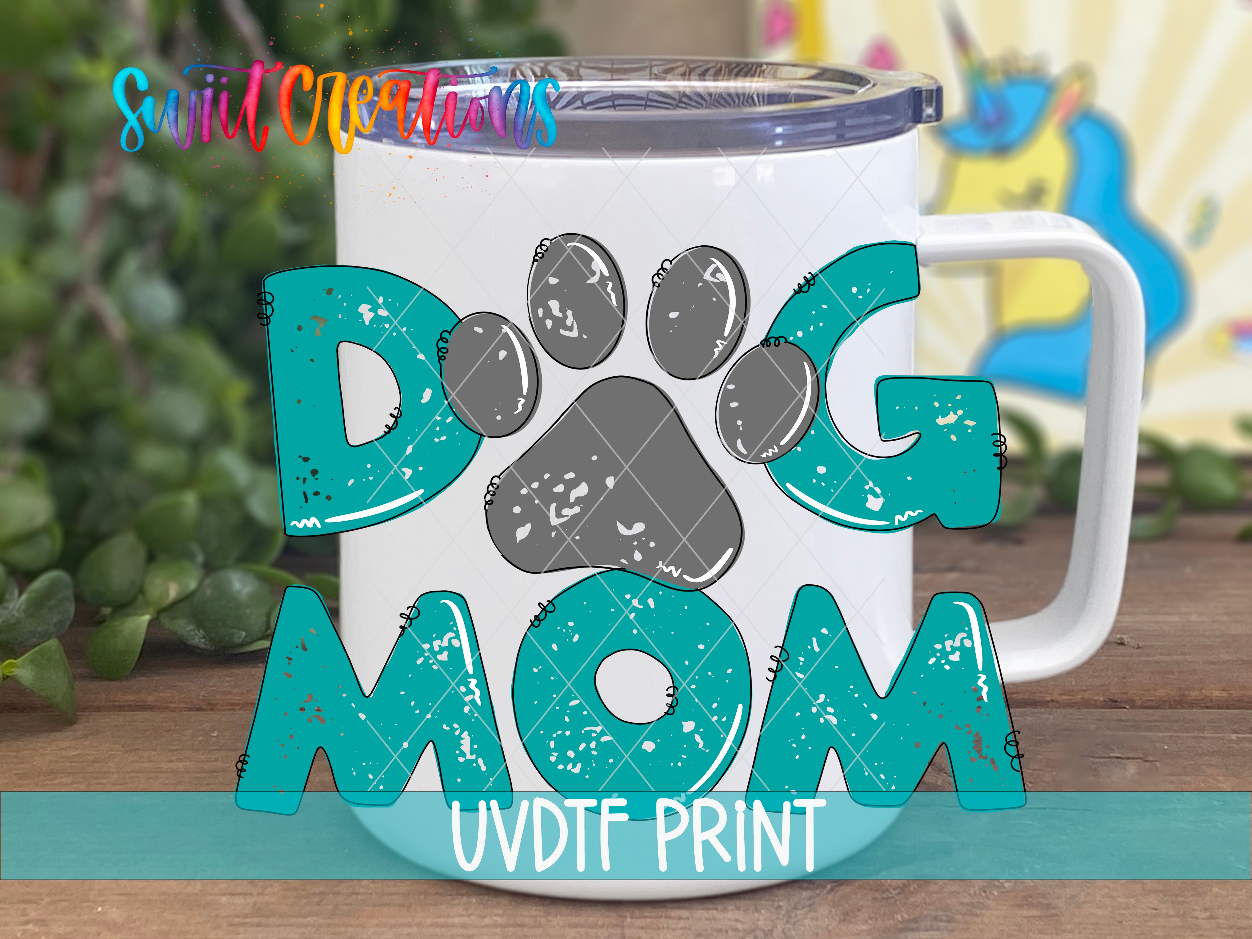 a coffee mug with a dog mom design on it