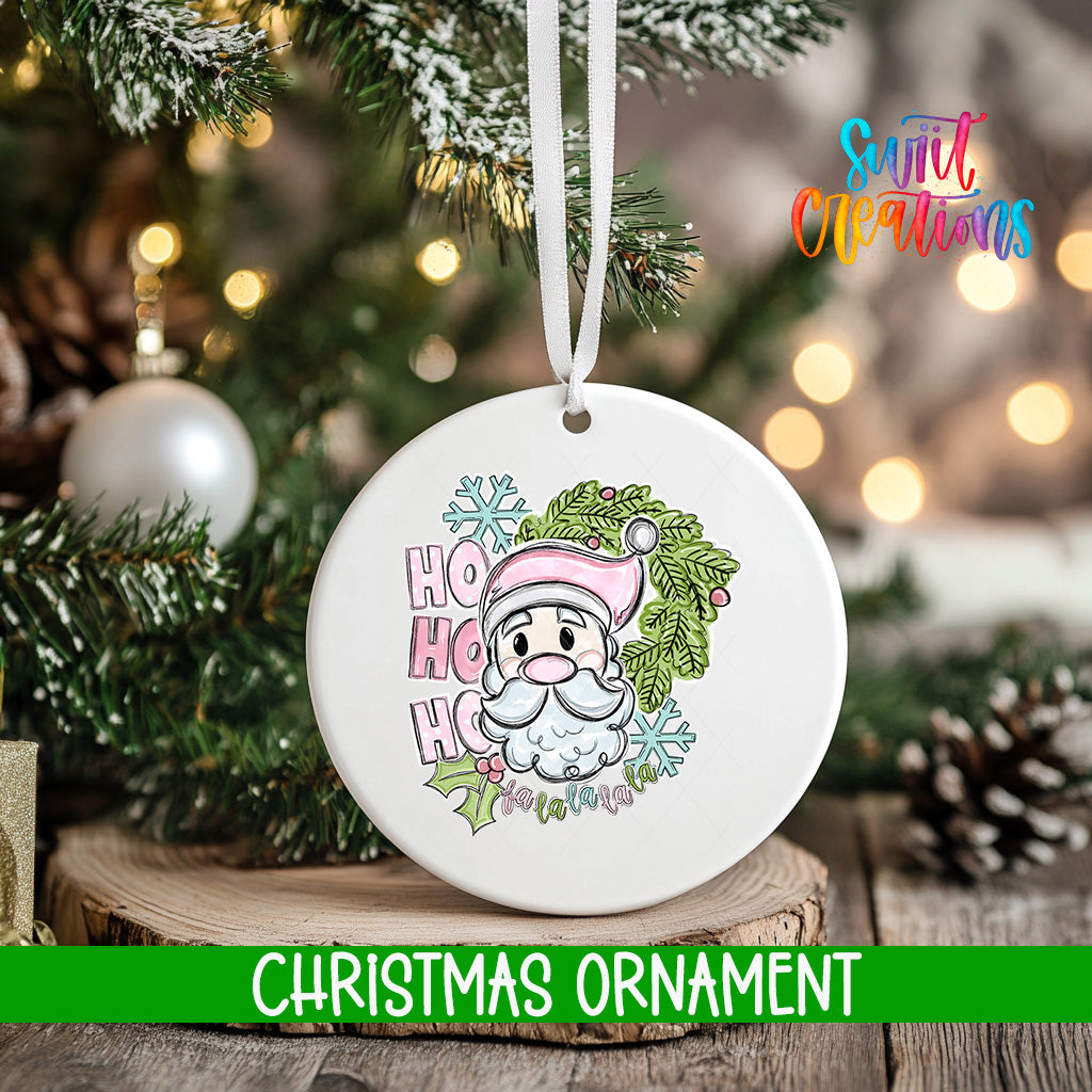 A white Christmas ornament with a Santa Claus face and the text "HOOK HOOK HOOK" hanging from a tree branch.