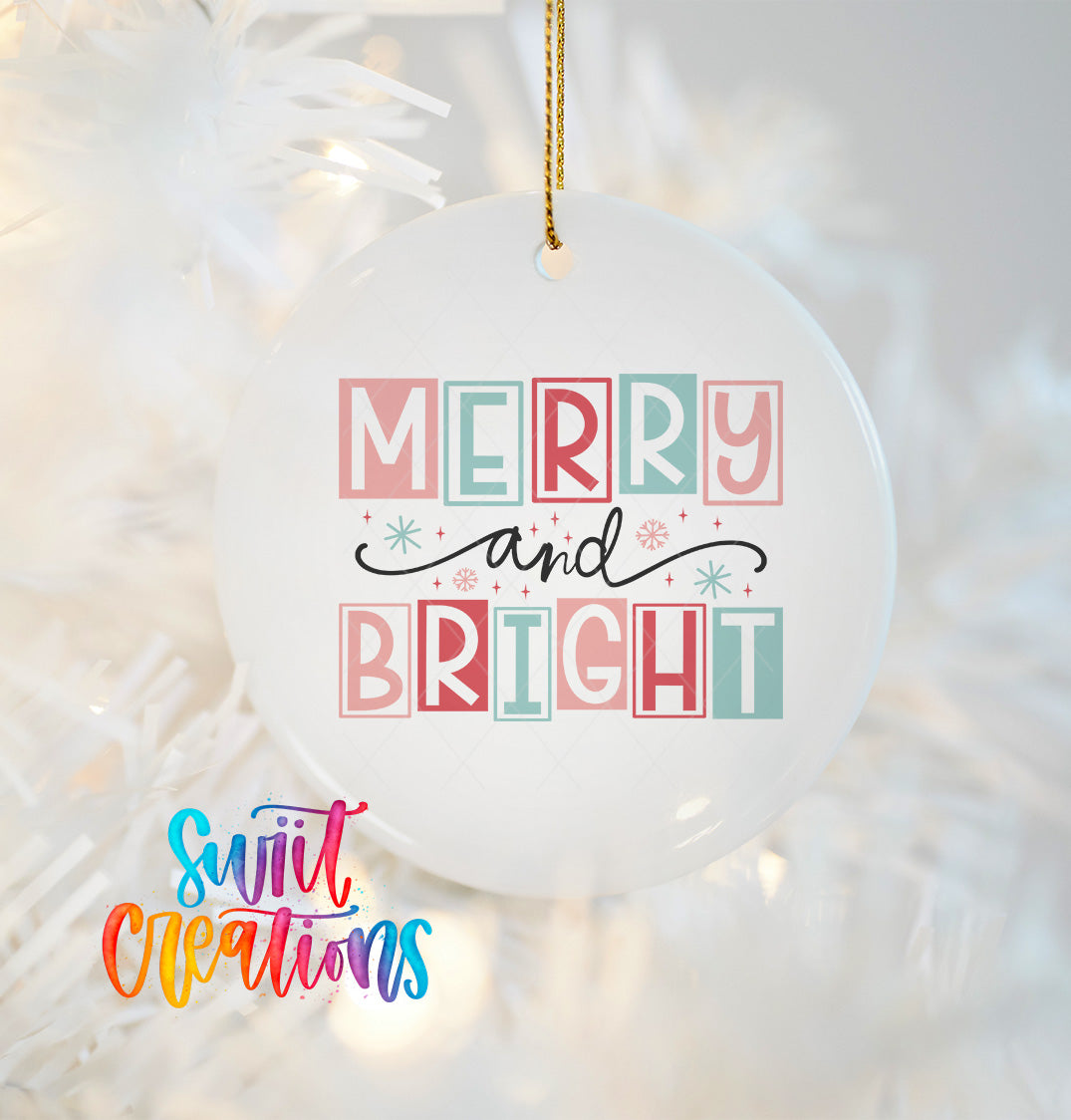 A white ceramic ornament with the text "MERRY AND BRIGHT" in a colorful, playful font.