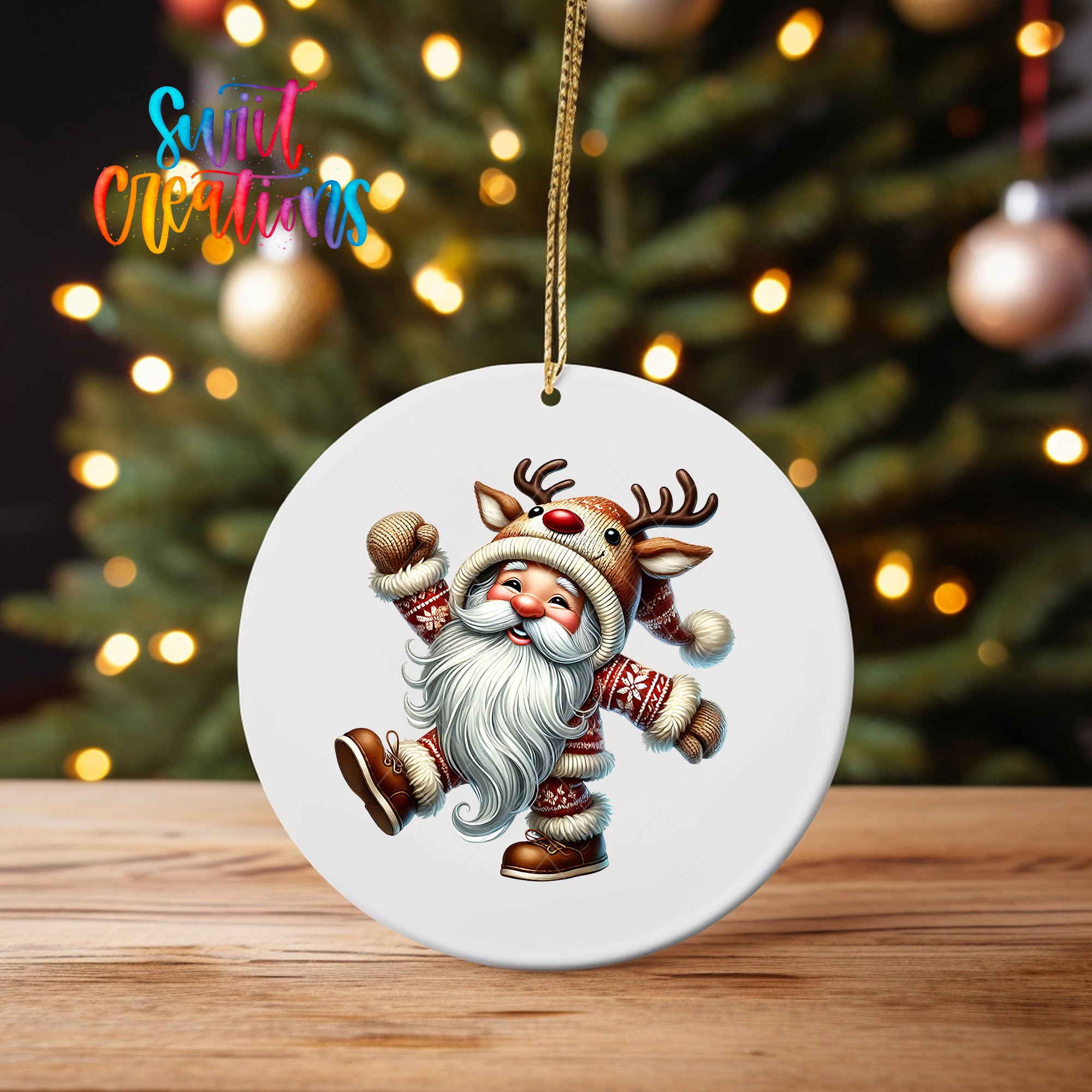 A white ornament featuring a cartoon reindeer character with a long white beard and antlers, wearing a Santa hat and holding a snowman.