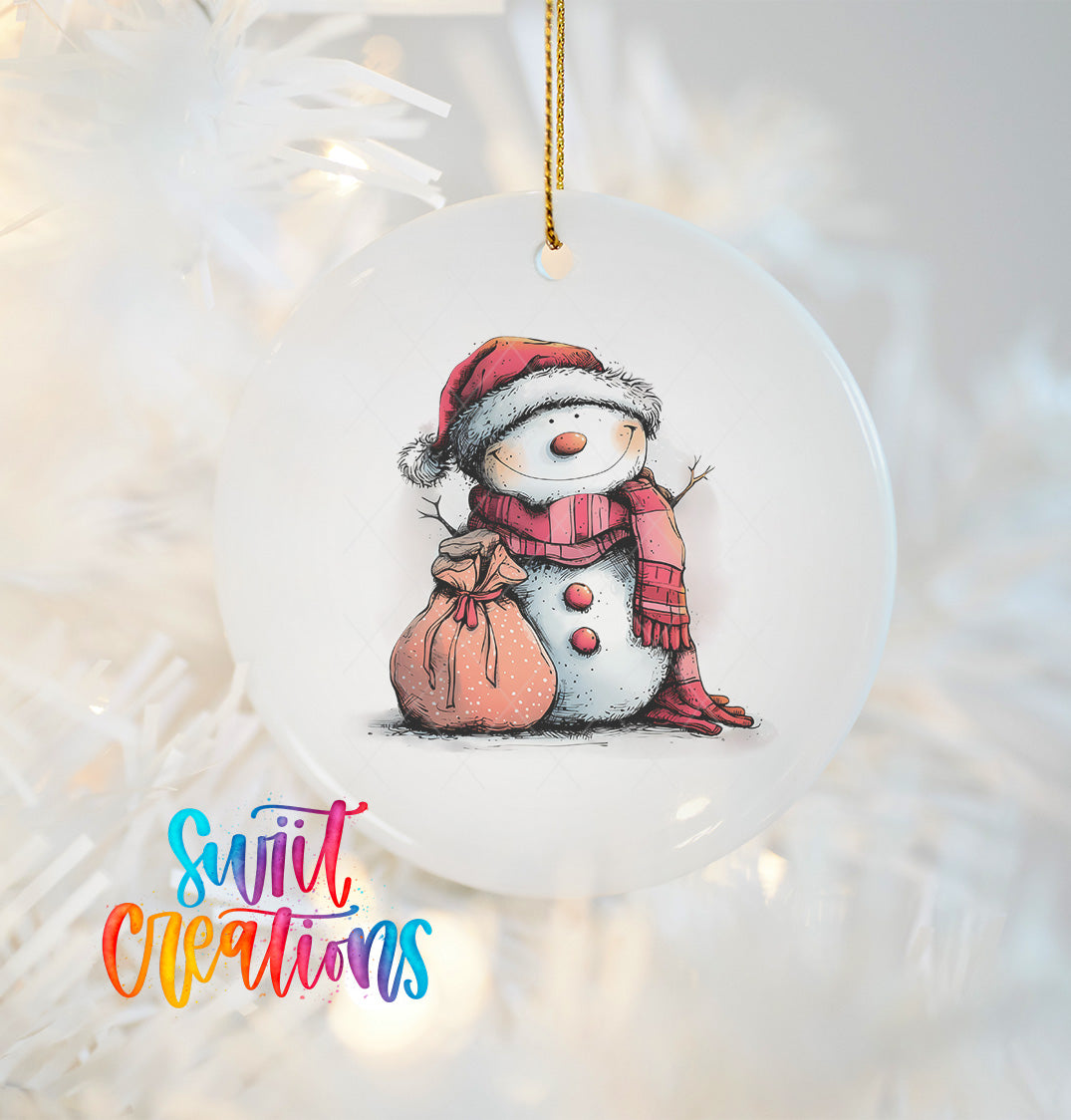 A white ceramic ornament featuring a cheerful snowman wearing a red hat and scarf, holding a bag, and smiling.