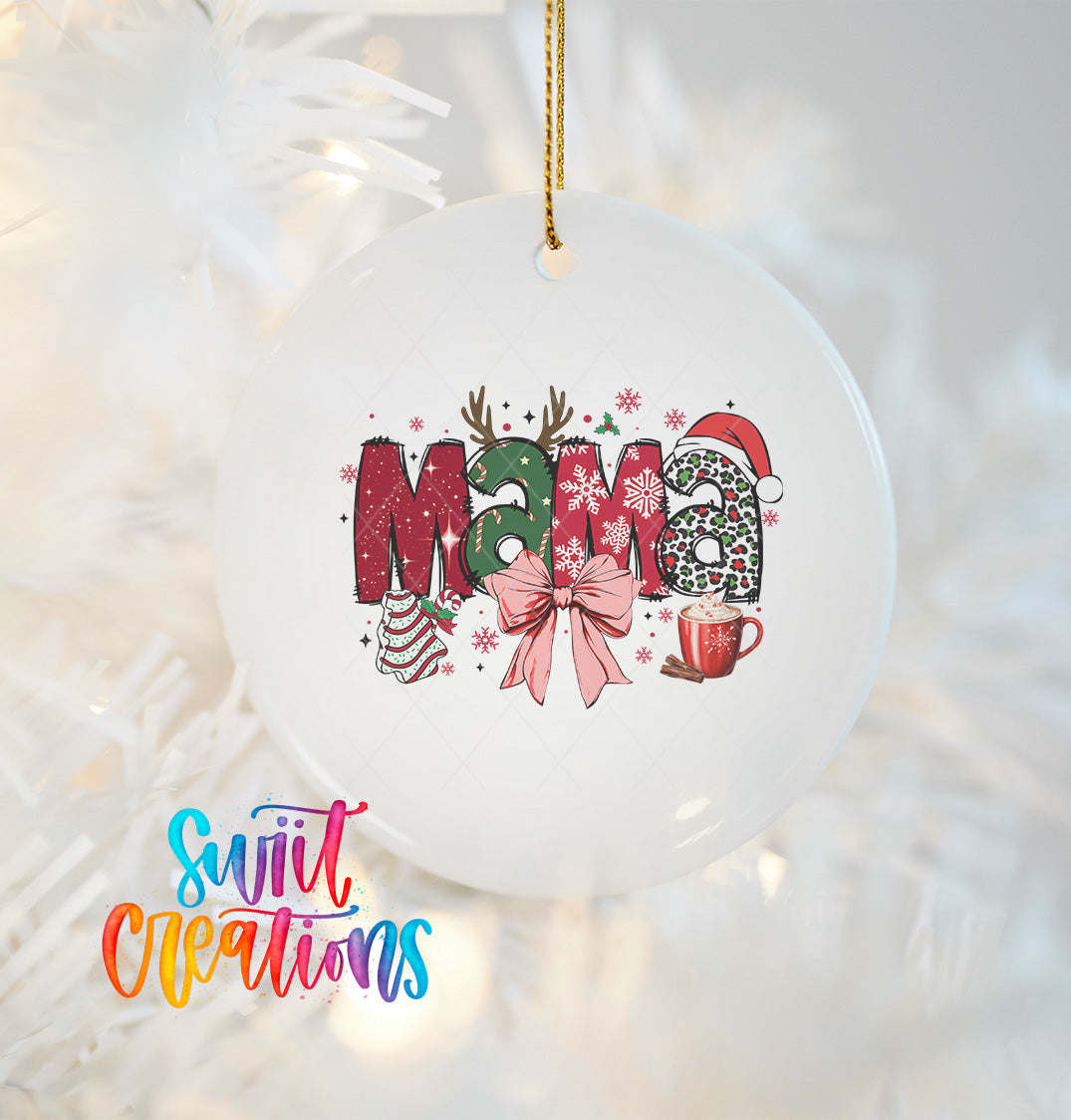 A white ornament with the word "Mama" written in colorful letters, surrounded by festive decorations such as snowflakes, a Santa hat, and a mug.