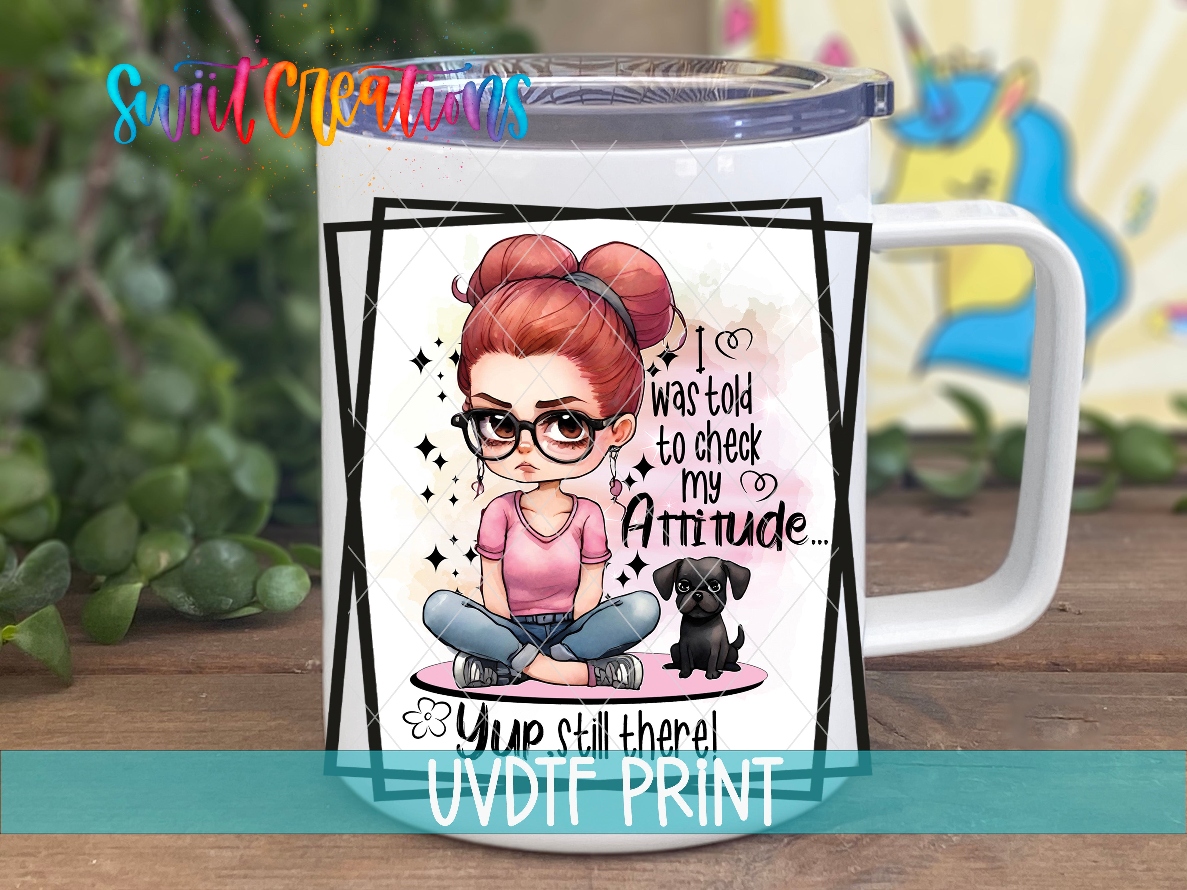 A mug with a cartoon illustration of a woman with glasses and a dog, along with text that says "I was told to check my Attitude..."
