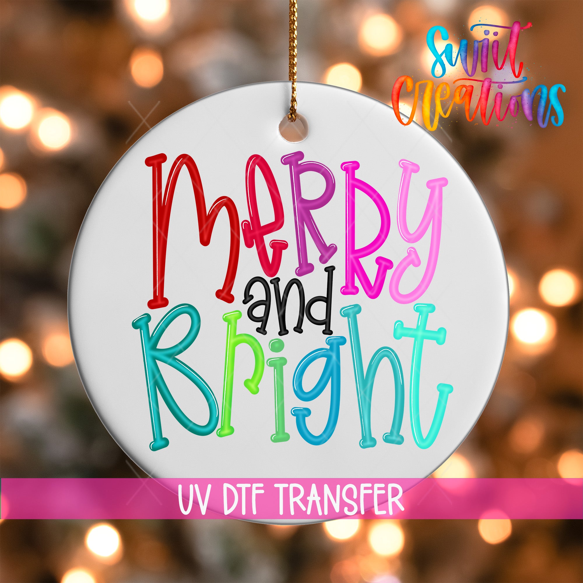 A white ornament with colorful text that says "Merry and Bright" hanging from a string.