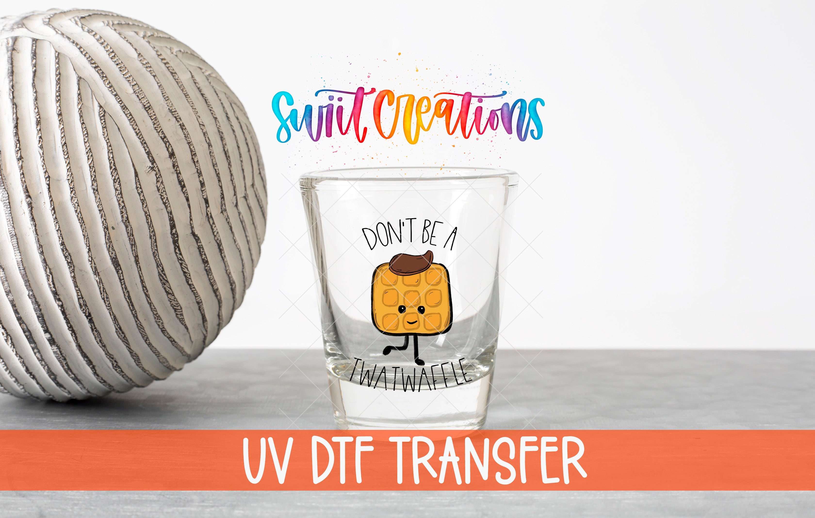 a glass with a cartoon waffle and the text "Don't be a waffle" on it, along with a colorful text overlay that says "Swift Creations UV Dtf Transfer".