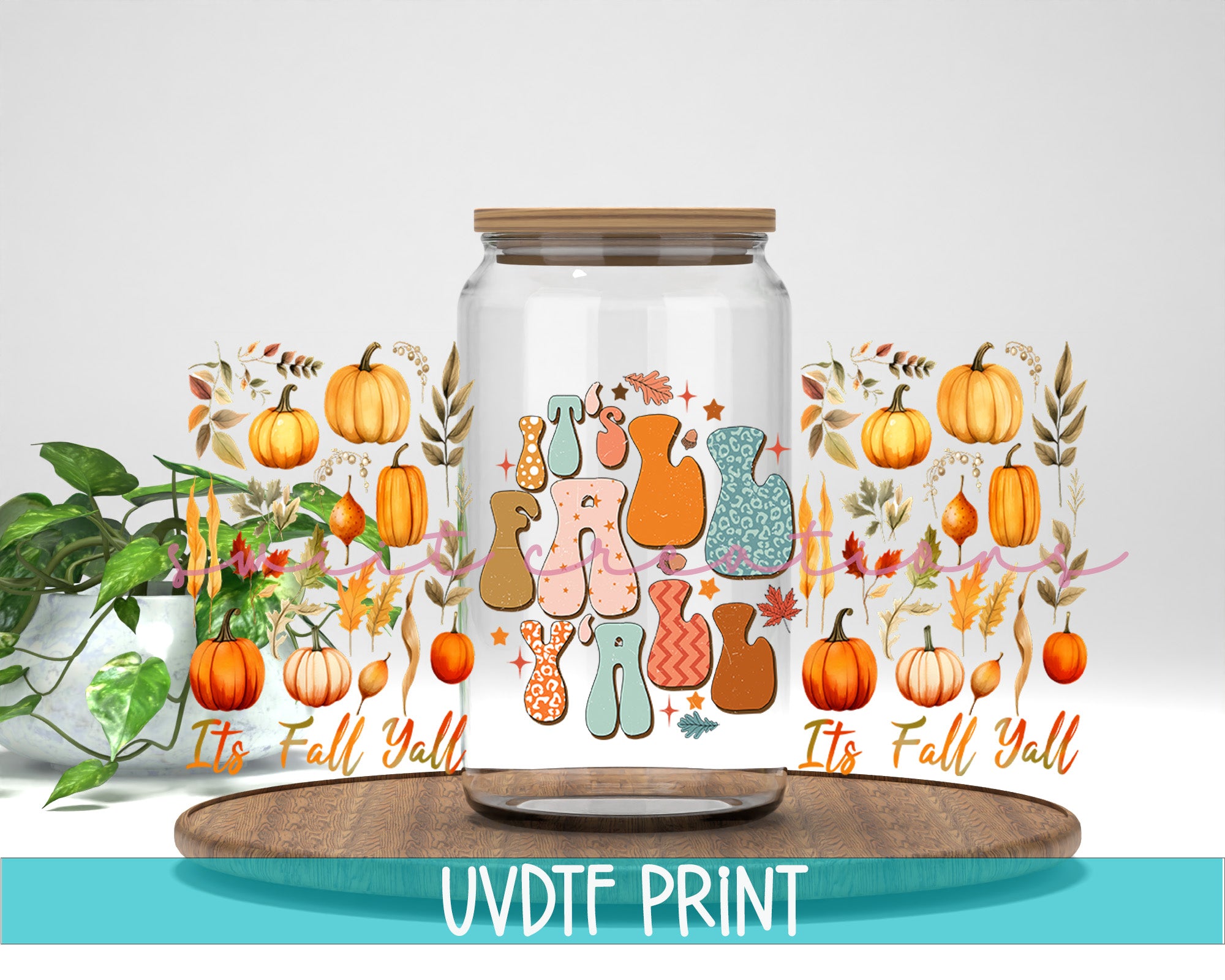 a glass jar with a picture of an elephant on it