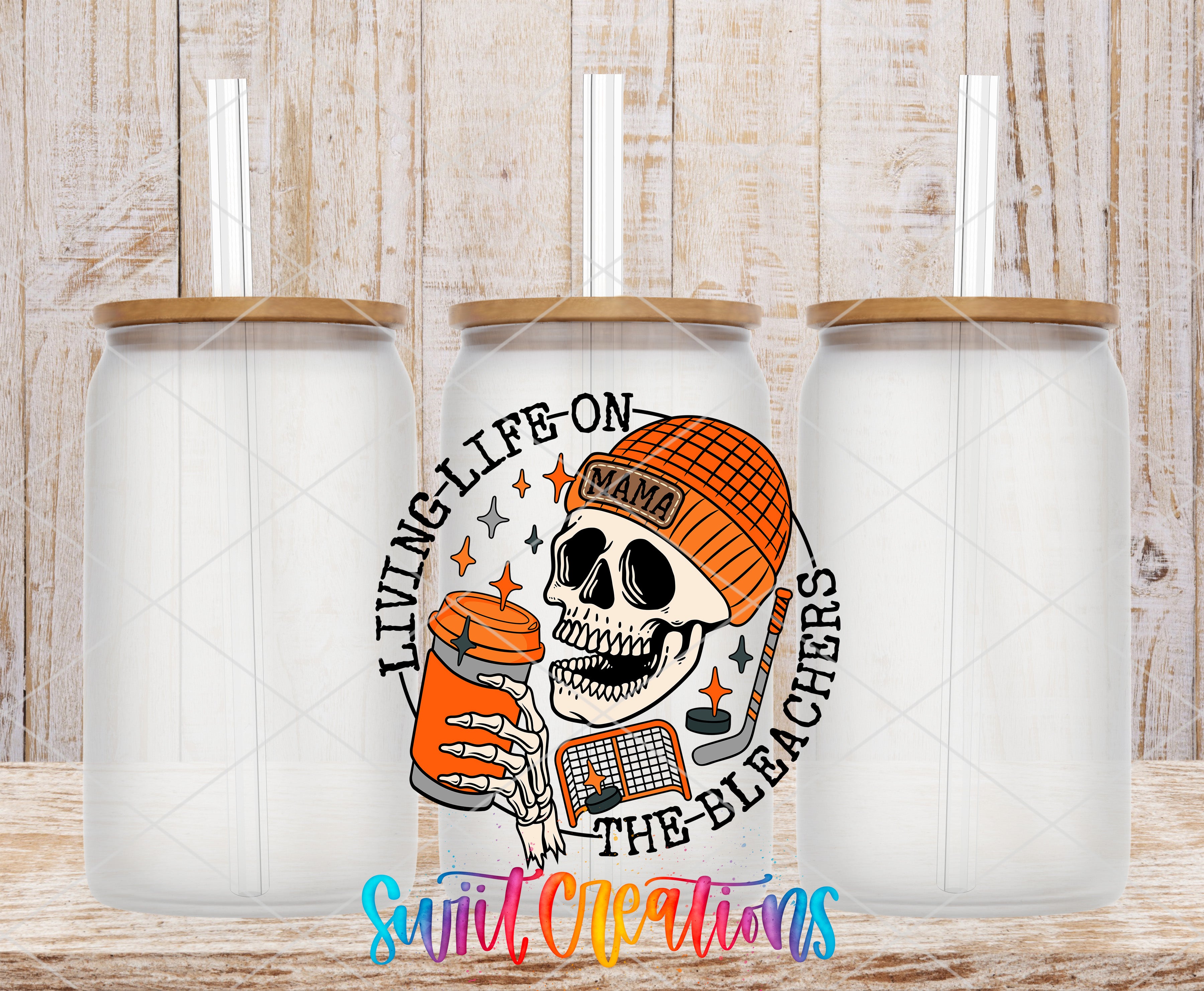 Swiit Creations UV DTF Living Life on the Bleachers Hockey transfer shown on a clear glass can set