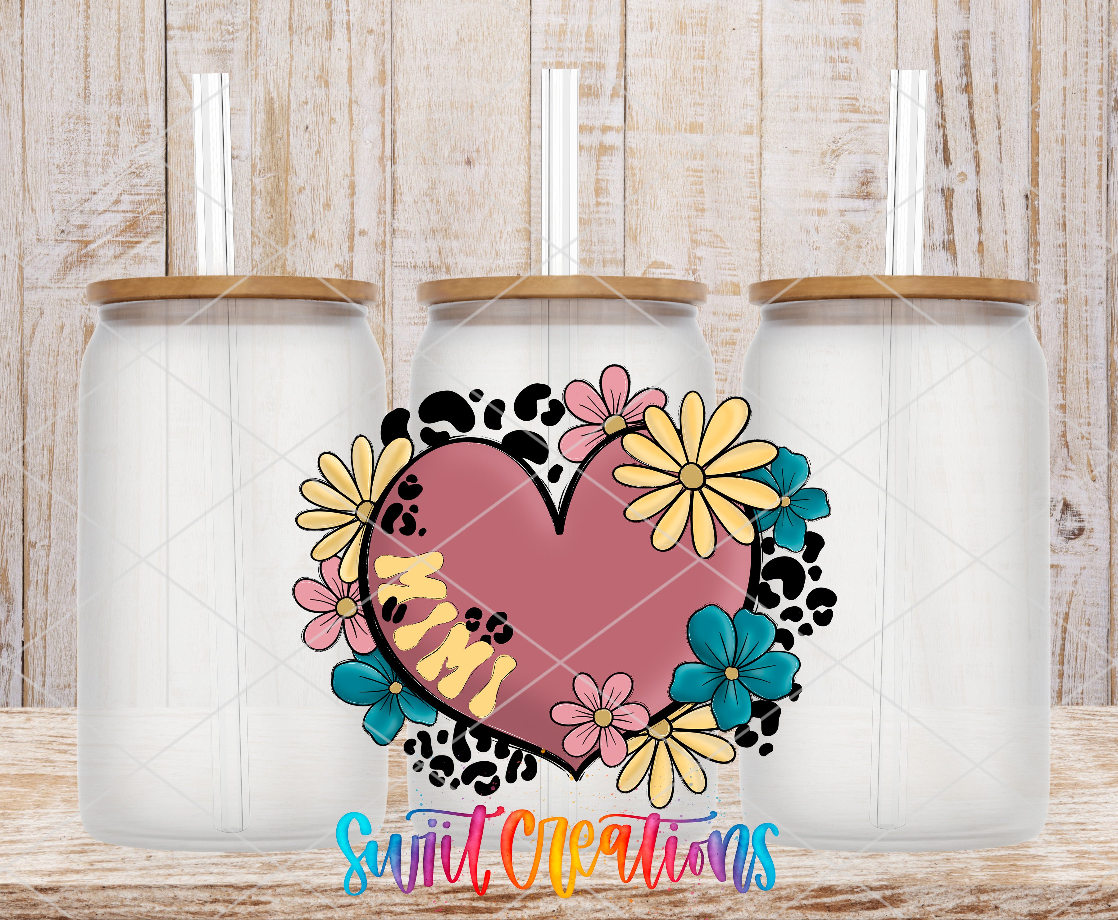 Swiit Creations UV DTF Floral Heart Mimi transfer shown on a clear glass can set