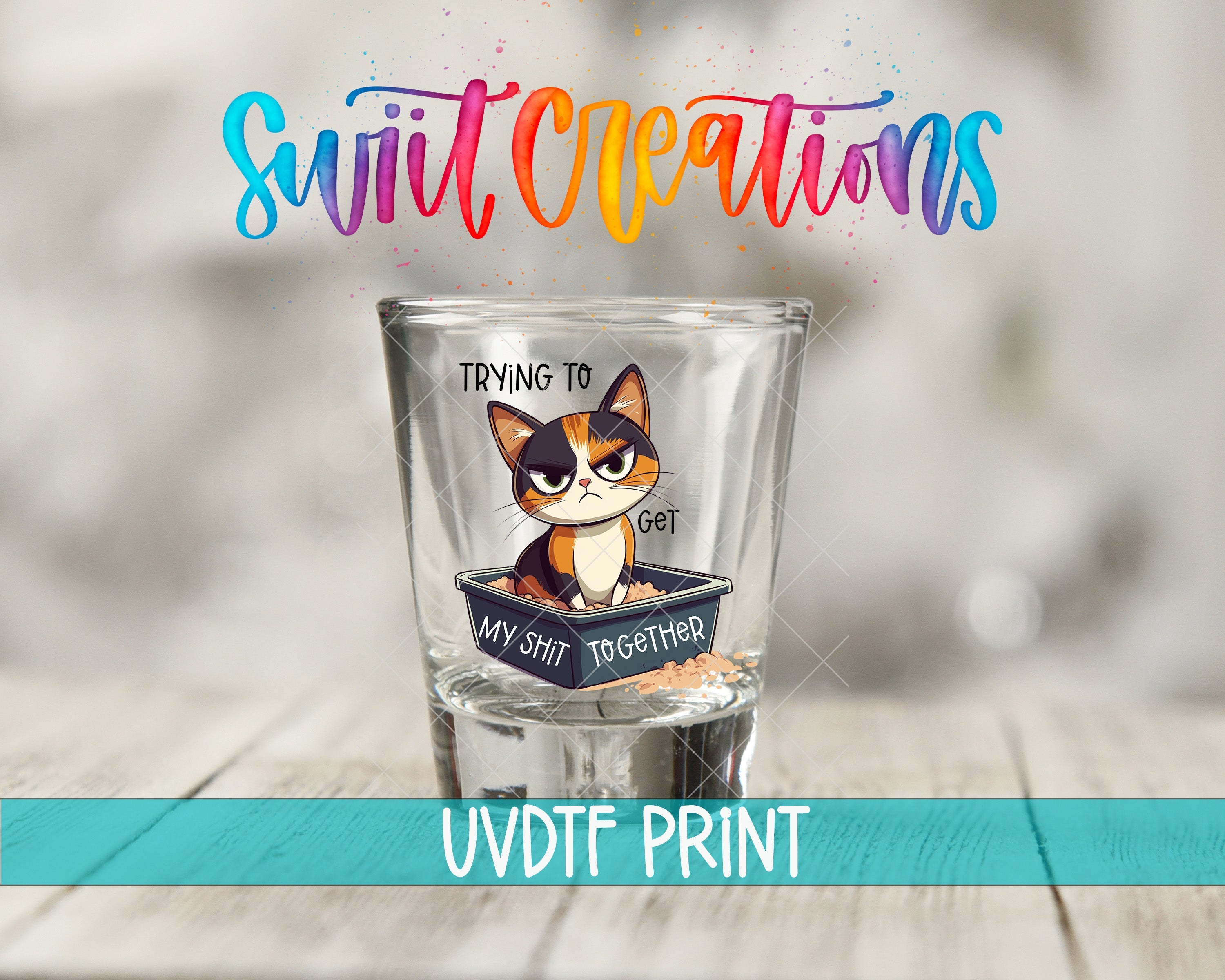 a glass with a picture of a cat in it