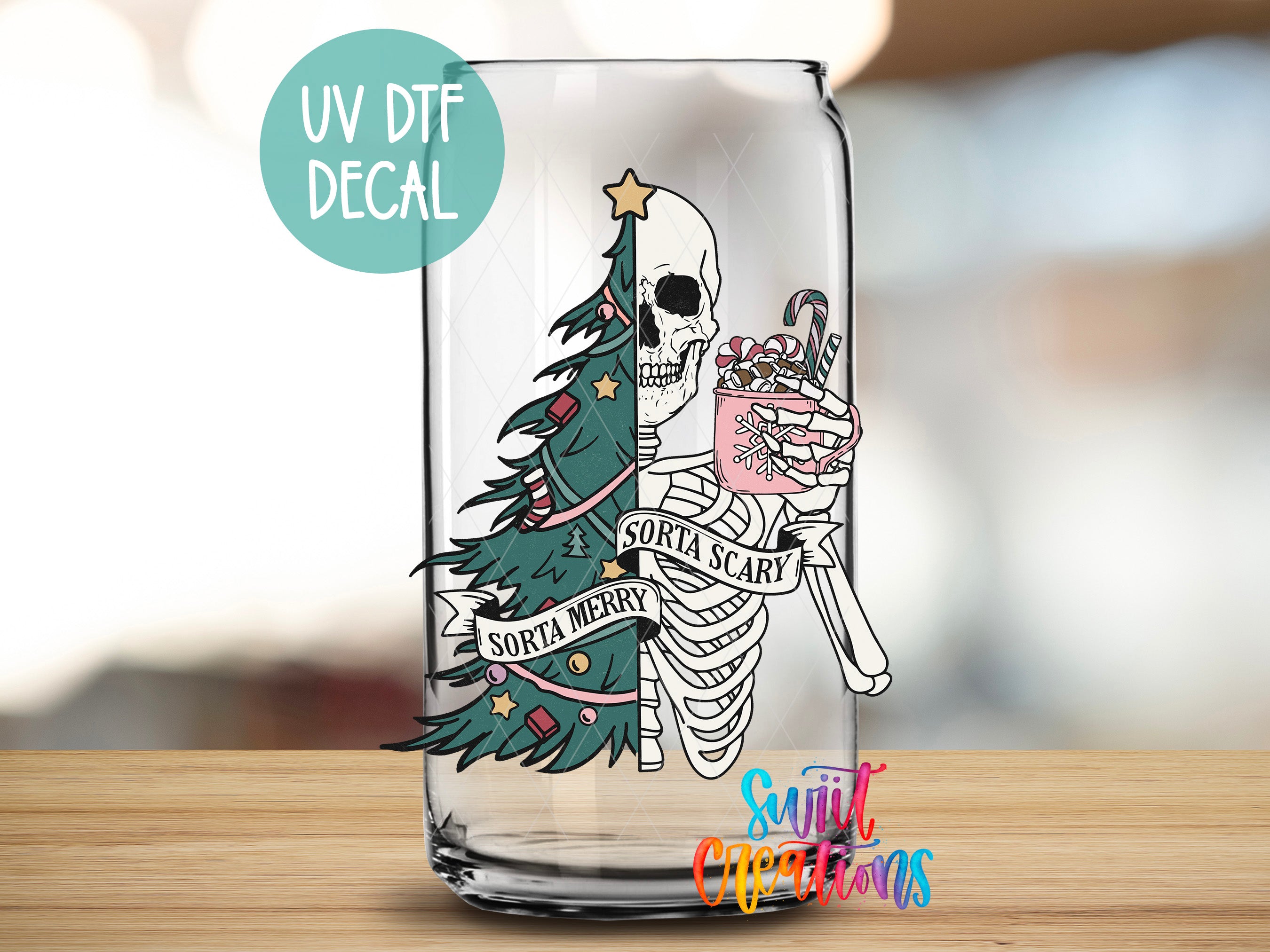 a glass with a skeleton holding a christmas tree