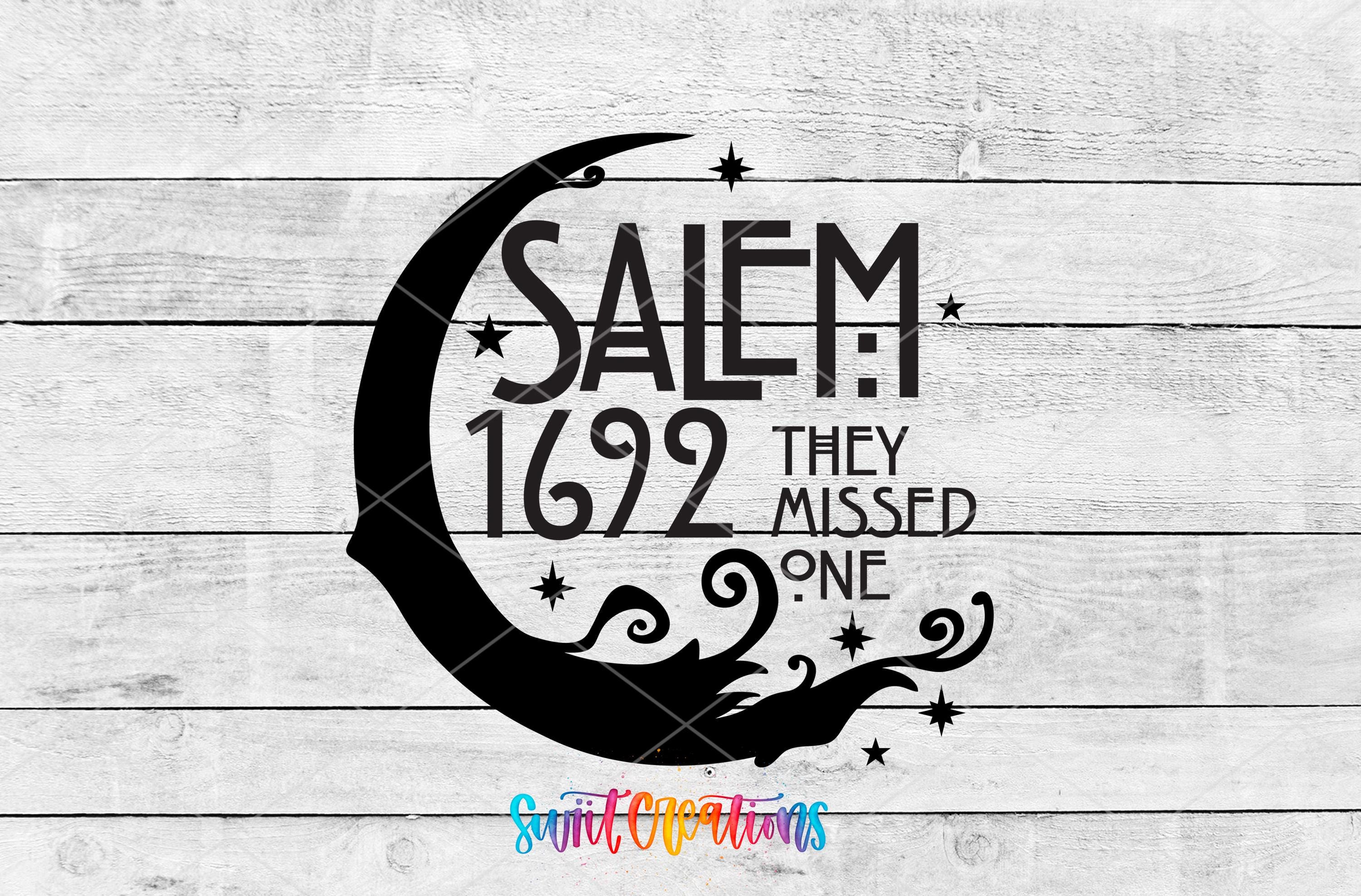a black silhouette of a crescent moon with stars and the text "SALEM 1692 THEY MISSED ONE" written in a stylized font.