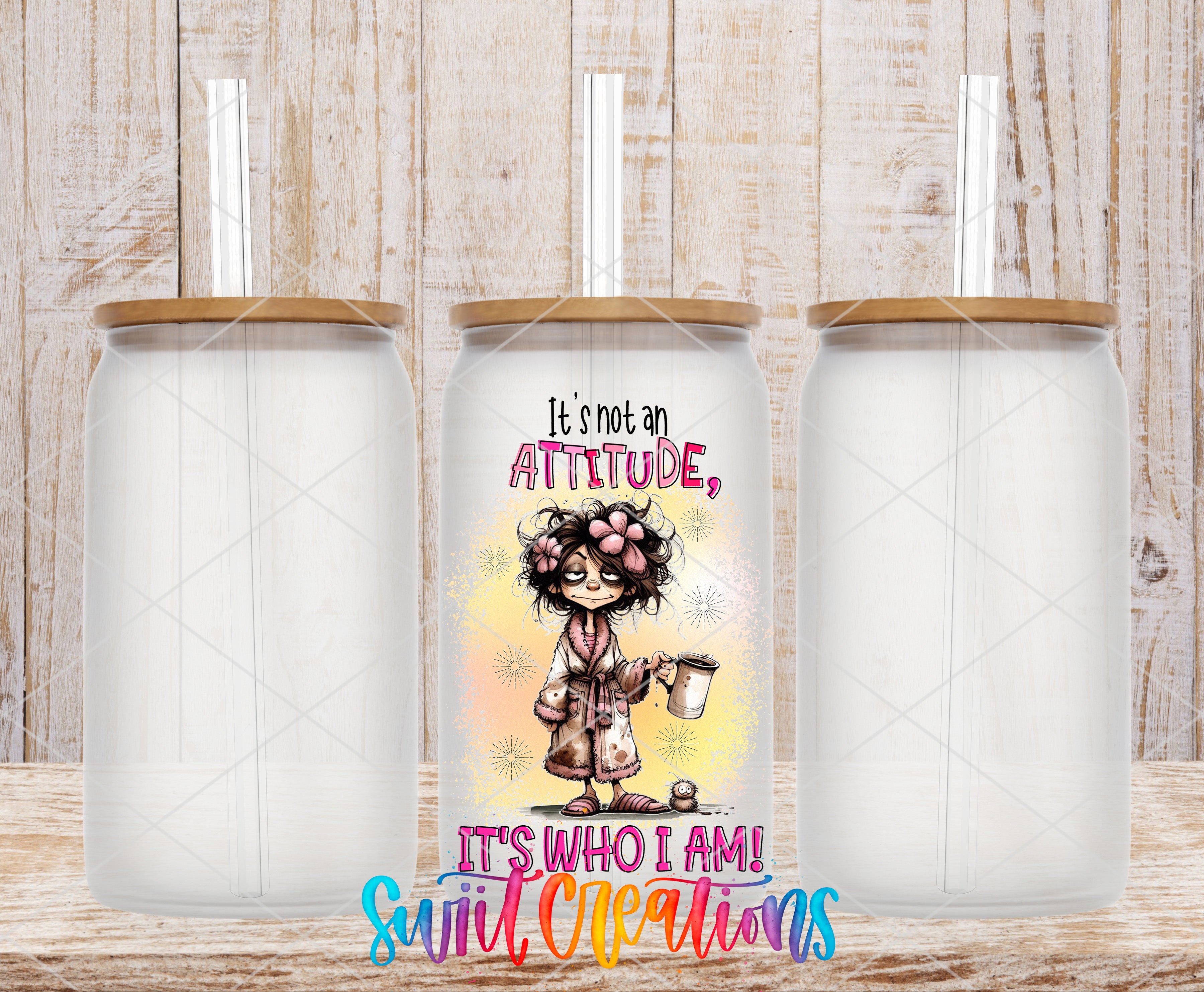 Swiit Creations UV DTF It's Not an Attitude transfer shown on a clear glass can set