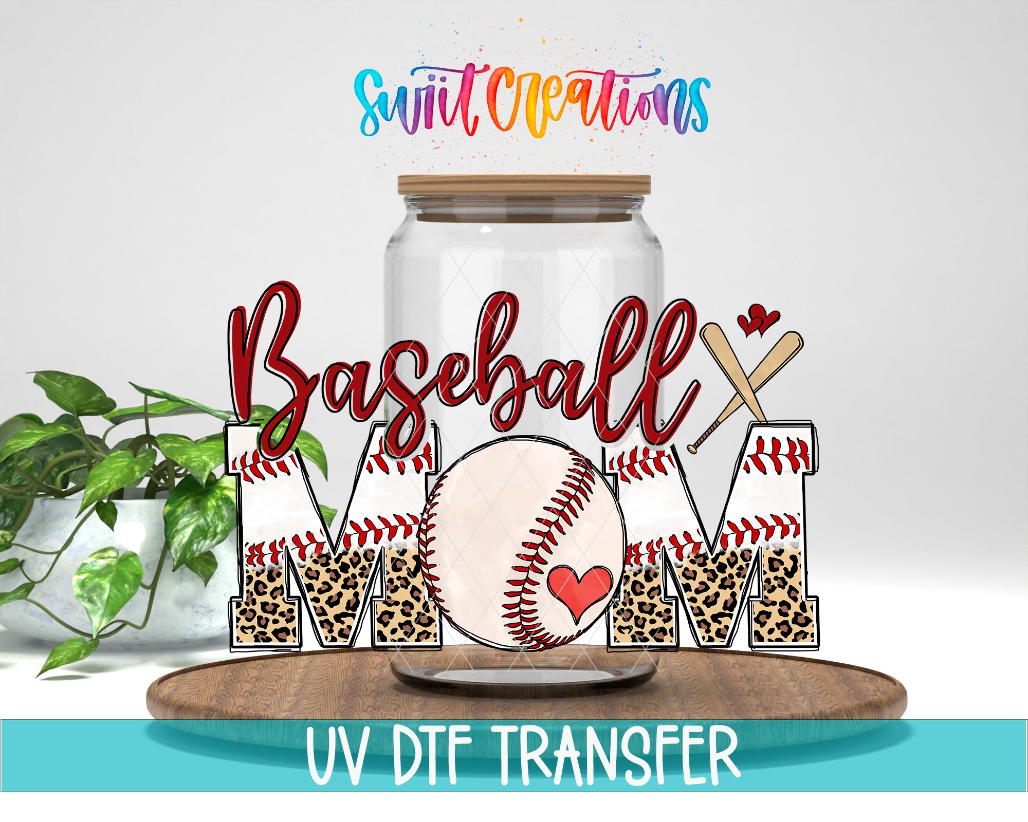 A glass jar with the word "Baseball Mom" written on it, along with baseball-related elements such as a baseball, a bat, and a heart. The jar is placed on a wooden tray, and there is a plant in the background. The image also includes text that says "Swit Creations UV Dtf Transfer".