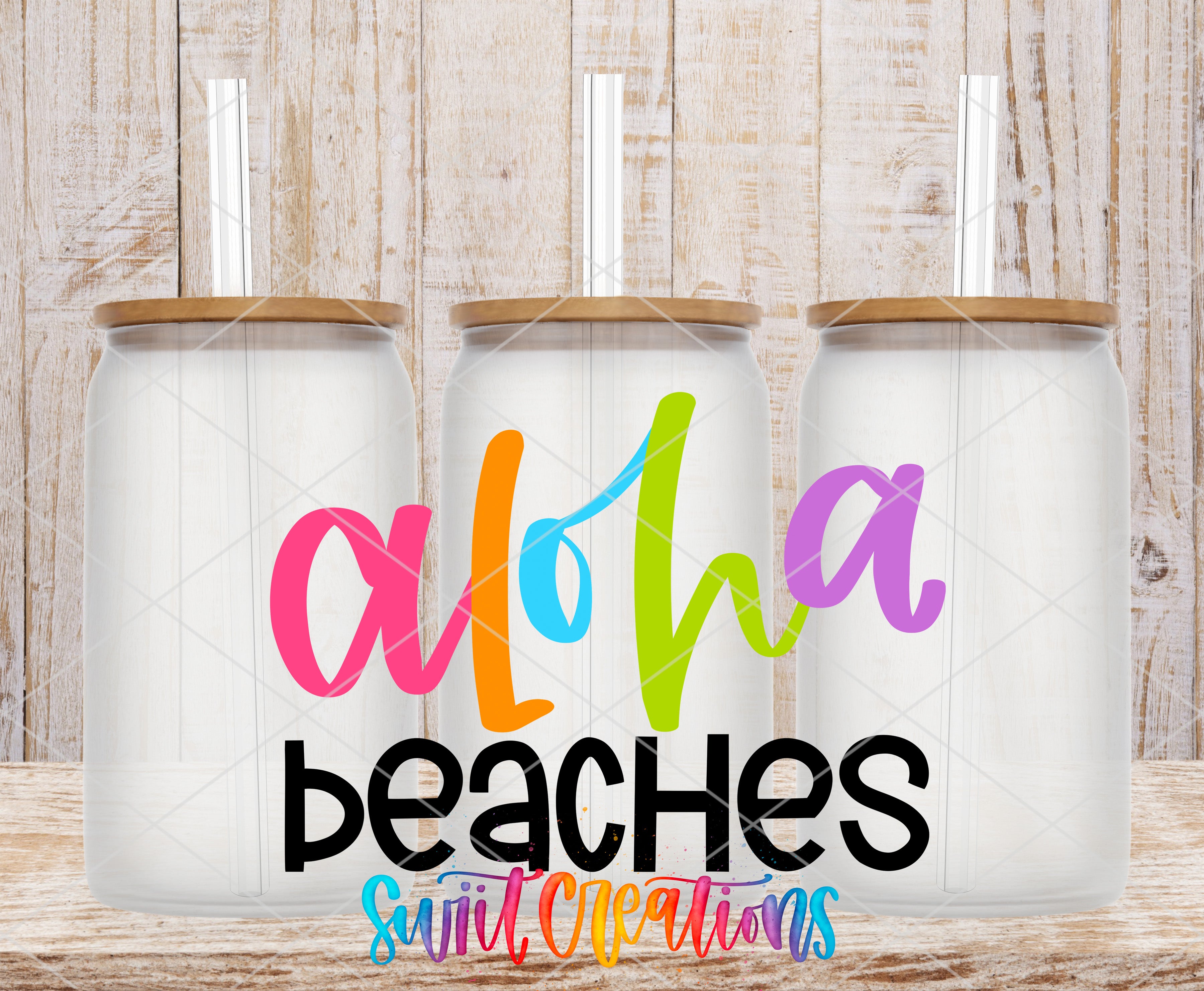three glass jars with straws, each with a lid, arranged in a row against a wooden background. The jars have colorful lids and the word "Aloha" written on them.