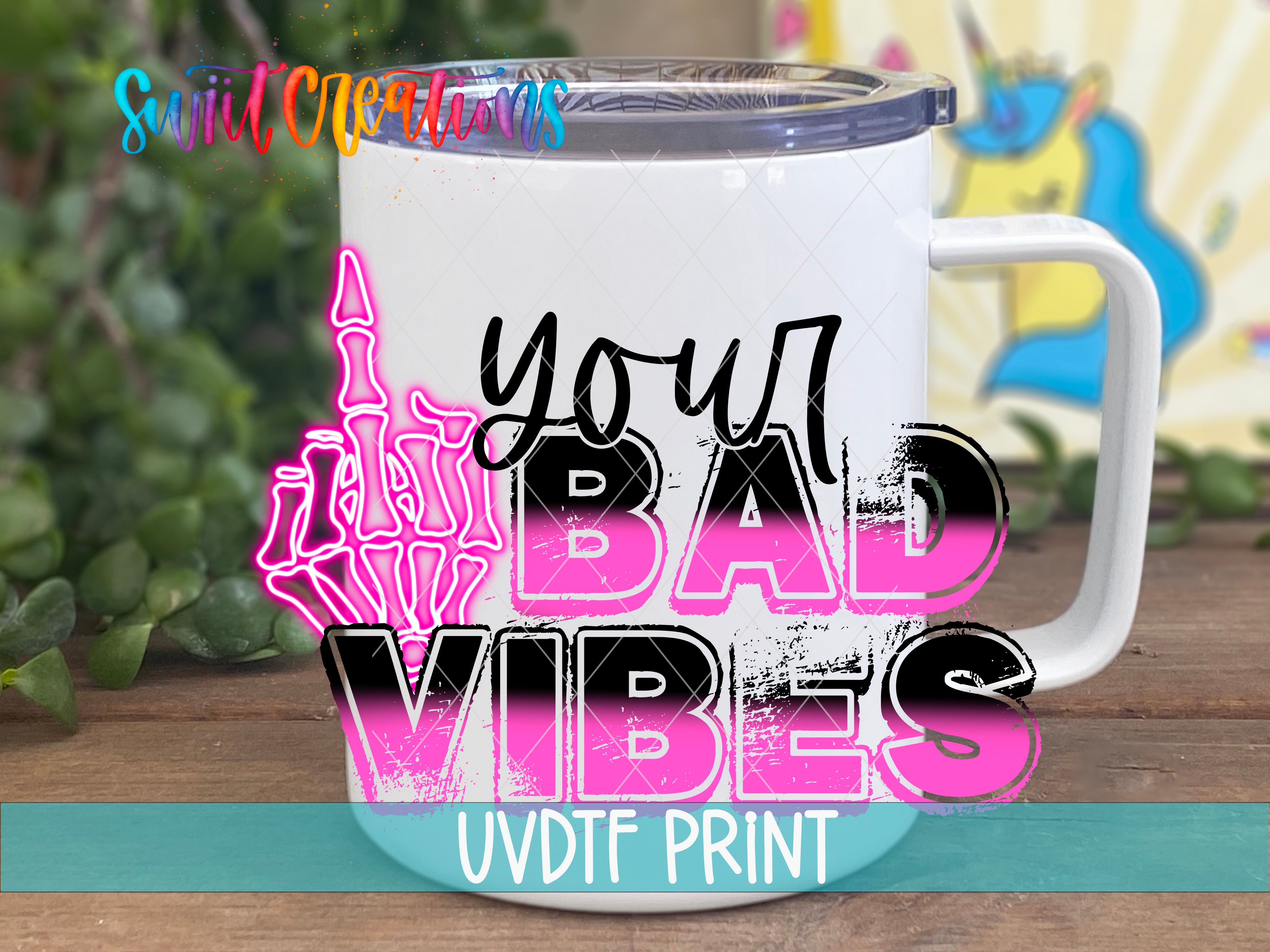a coffee mug with the words you're bad vibes on it