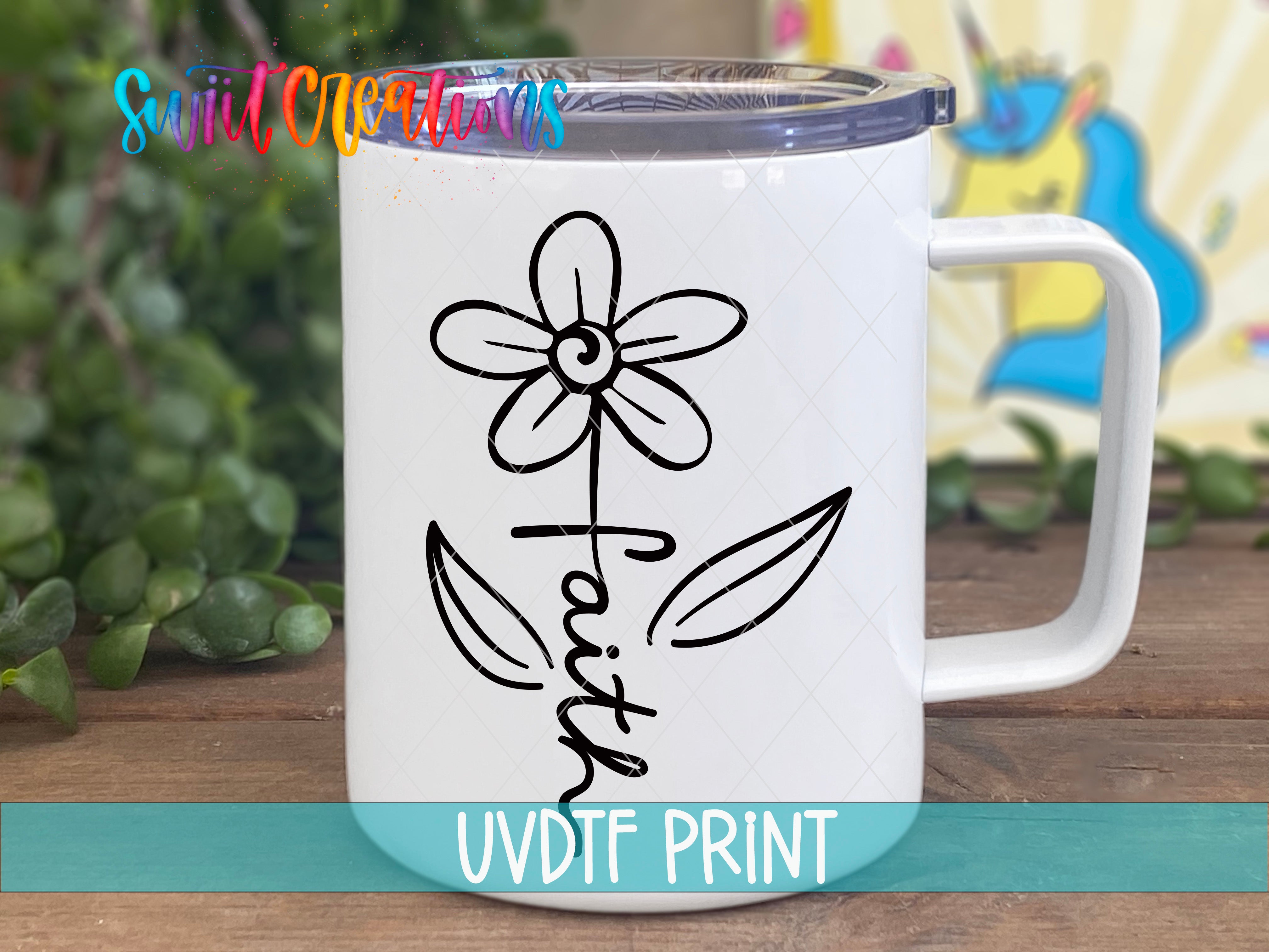 a white coffee mug with a flower on it
