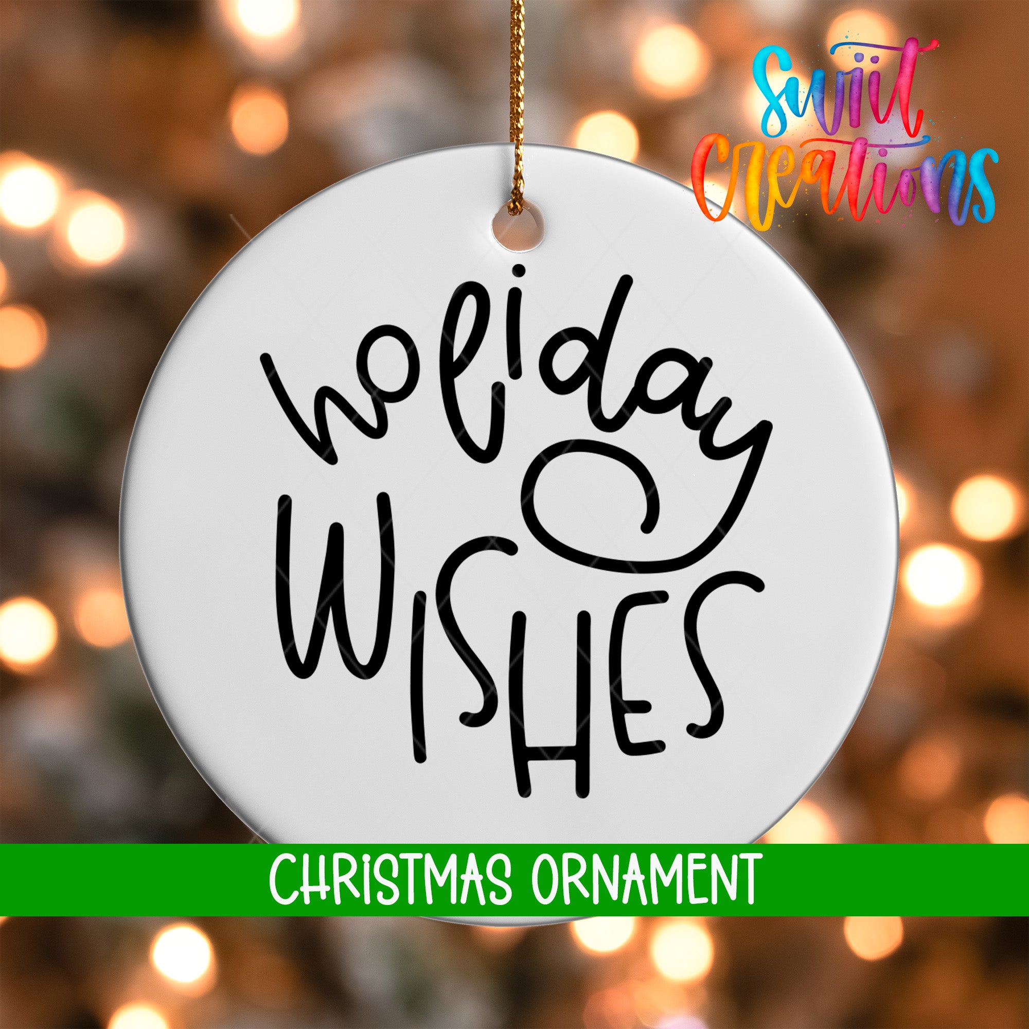A white Christmas ornament with the text "Holiday Wishes" written on it, hanging against a background of colorful lights.