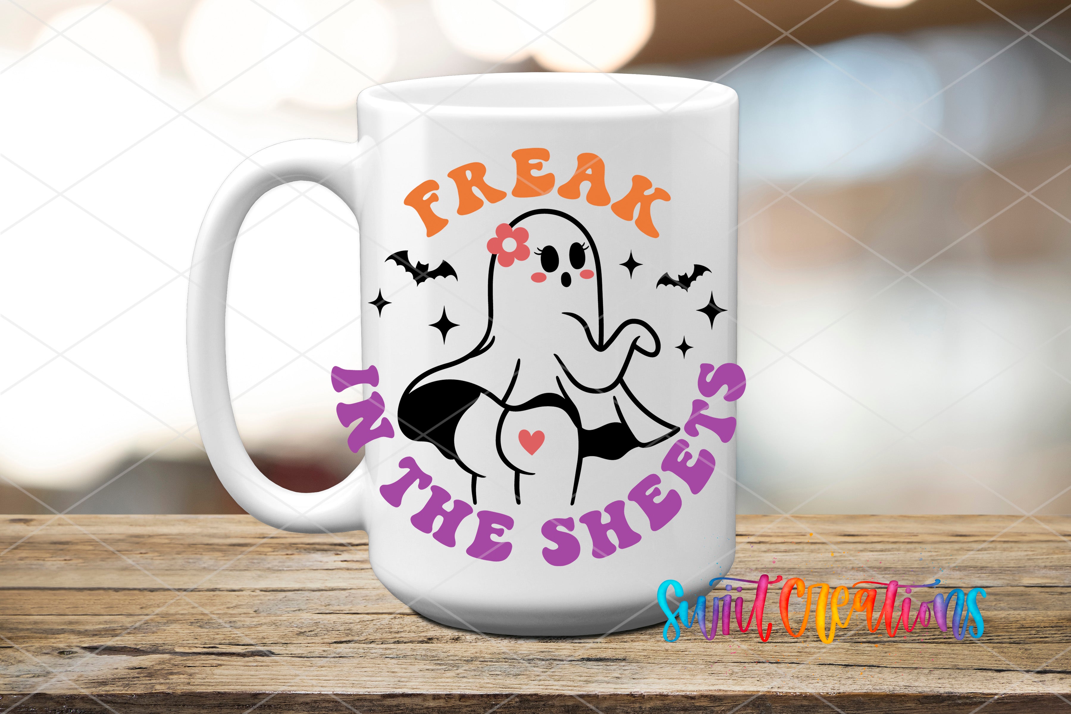 Swiit Creations UV DTF Freak In The Sheets Sassy Halloween transfer applied to a white ceramic mug