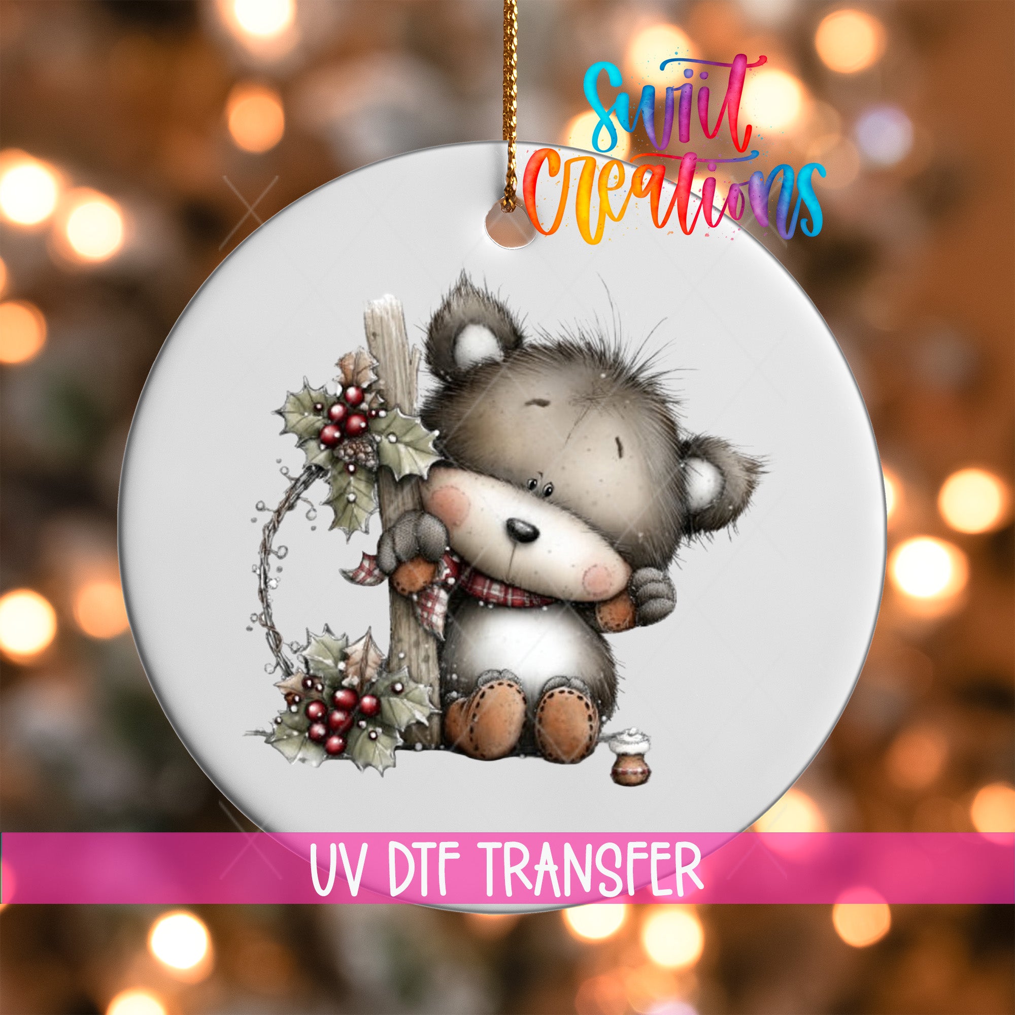 A white ornament with a cute bear holding a holly leaf and berries, surrounded by a festive background with twinkling lights.