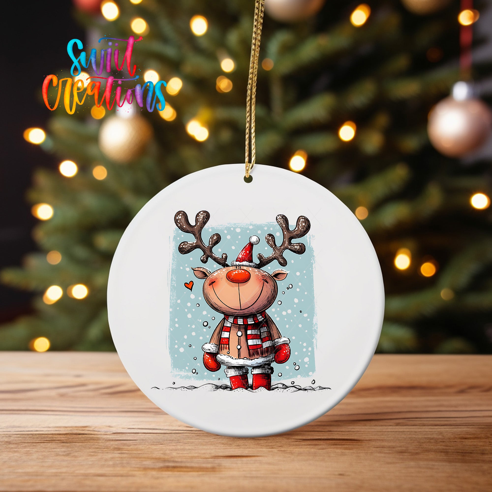 A white ornament featuring a cartoon reindeer with antlers and a red scarf, standing on a snowy surface.