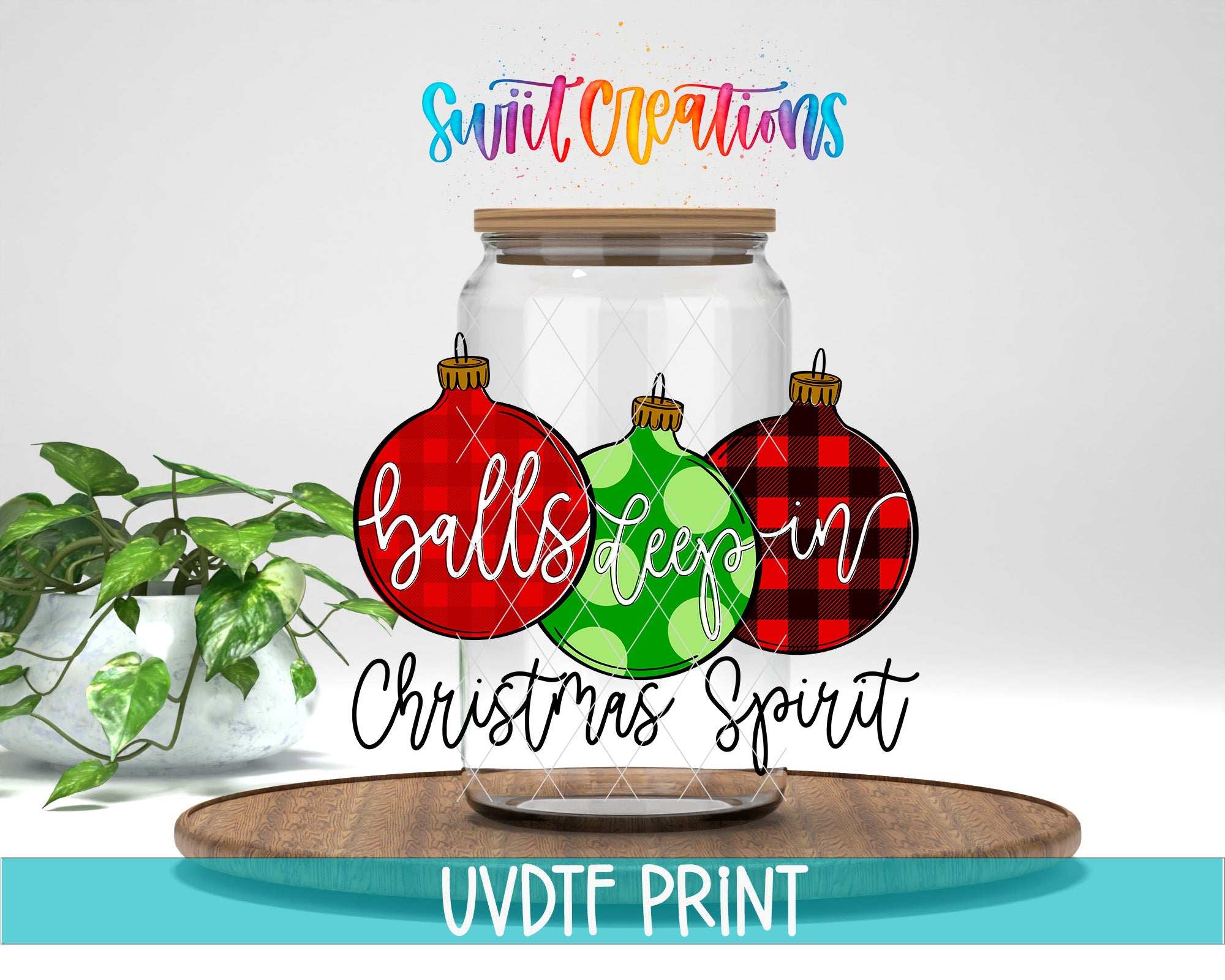 A glass jar with three Christmas ornaments inside, along with the text "balls keep in christmas spirit" and "Swift Creations" written above it.