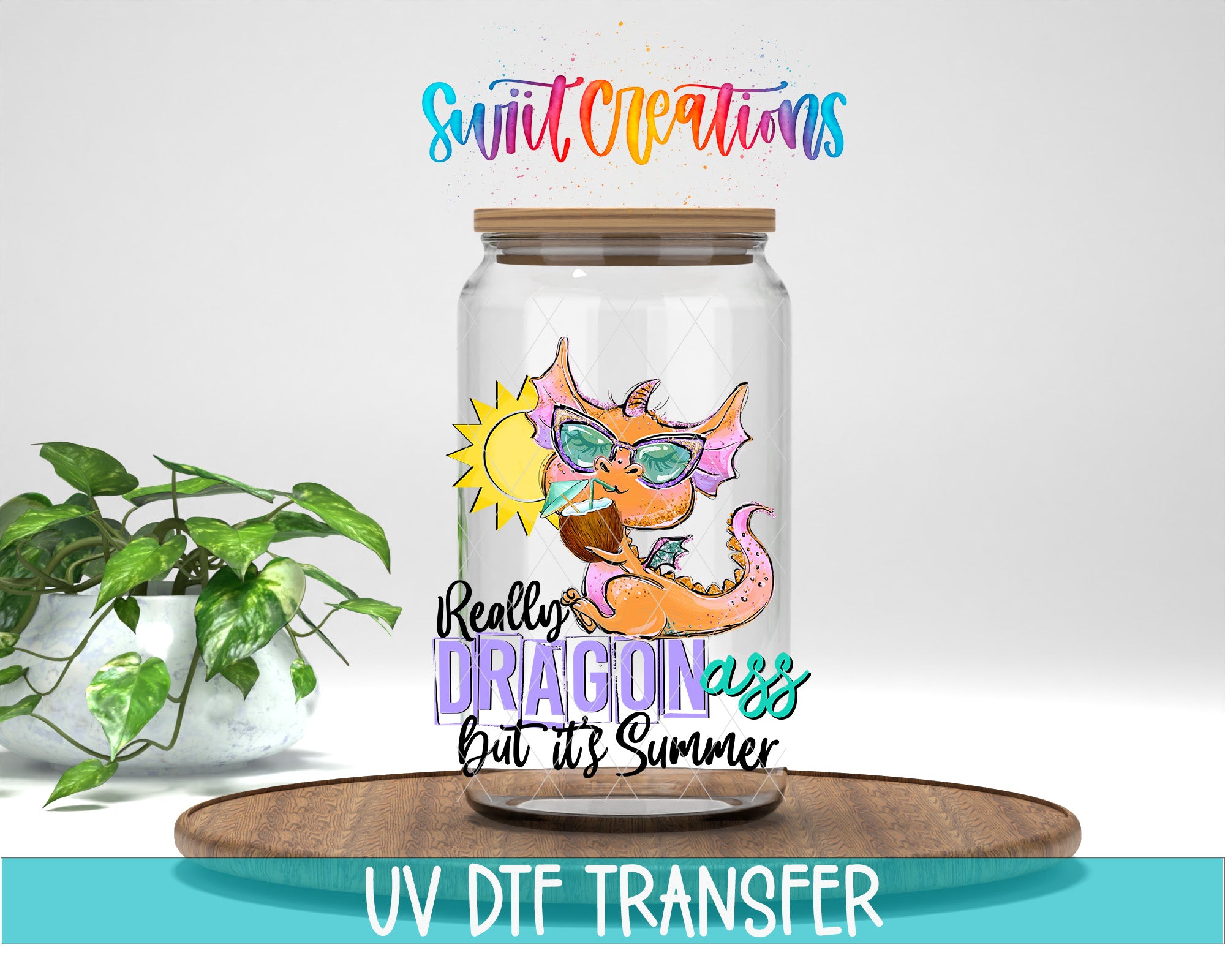 A glass jar with a dragon design and sunglasses on top, placed on a wooden surface. The jar has a lid and is surrounded by a potted plant.