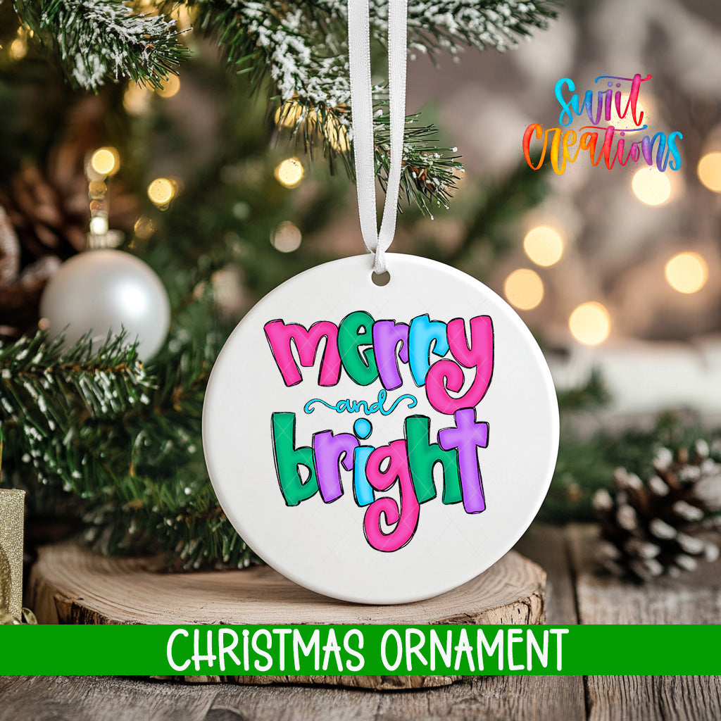 A white Christmas ornament with the text "Merry and Bright" in colorful letters hangs from a tree branch.