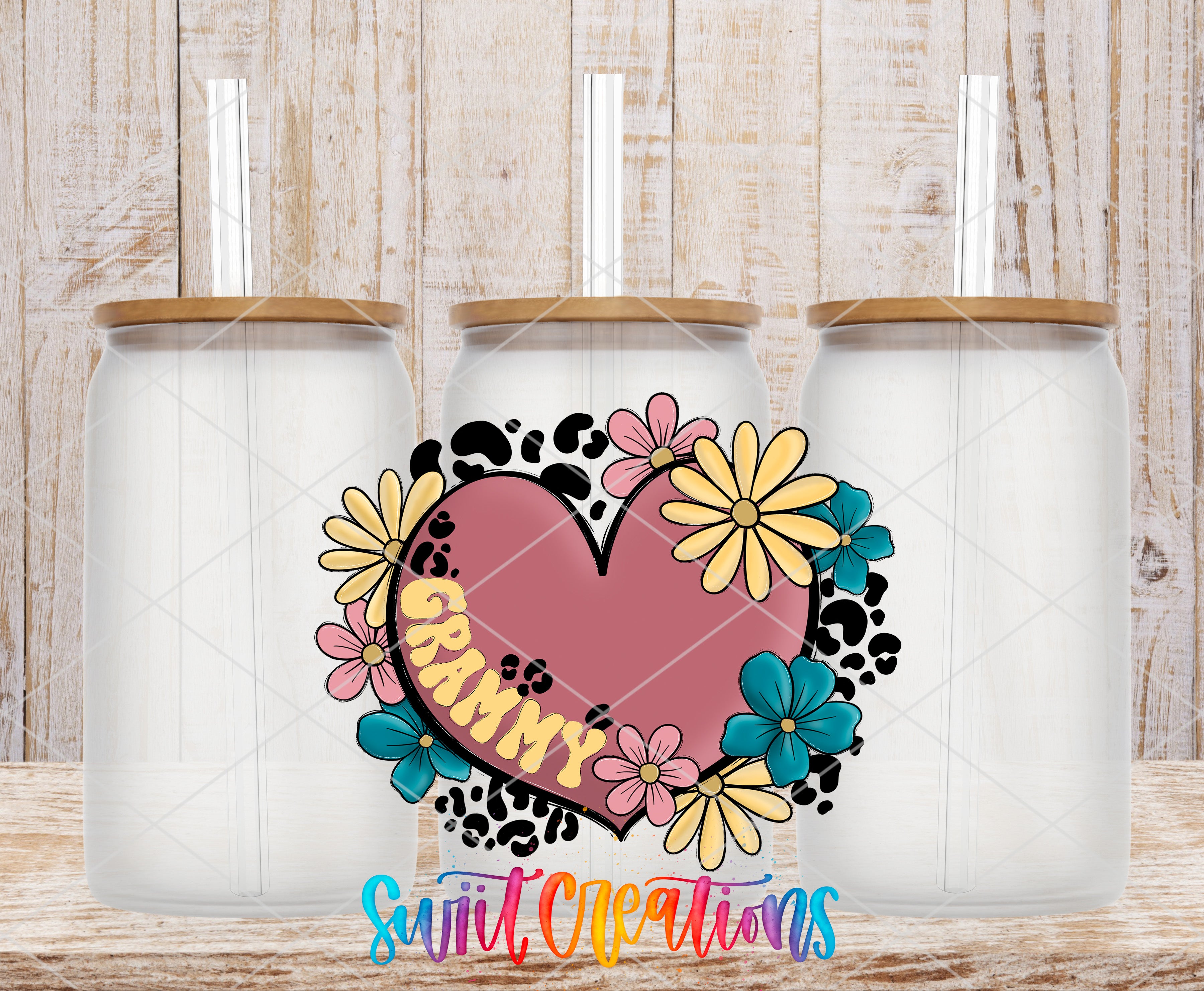 Swiit Creations UV DTF Floral Heart Grammy transfer shown on a clear glass can set