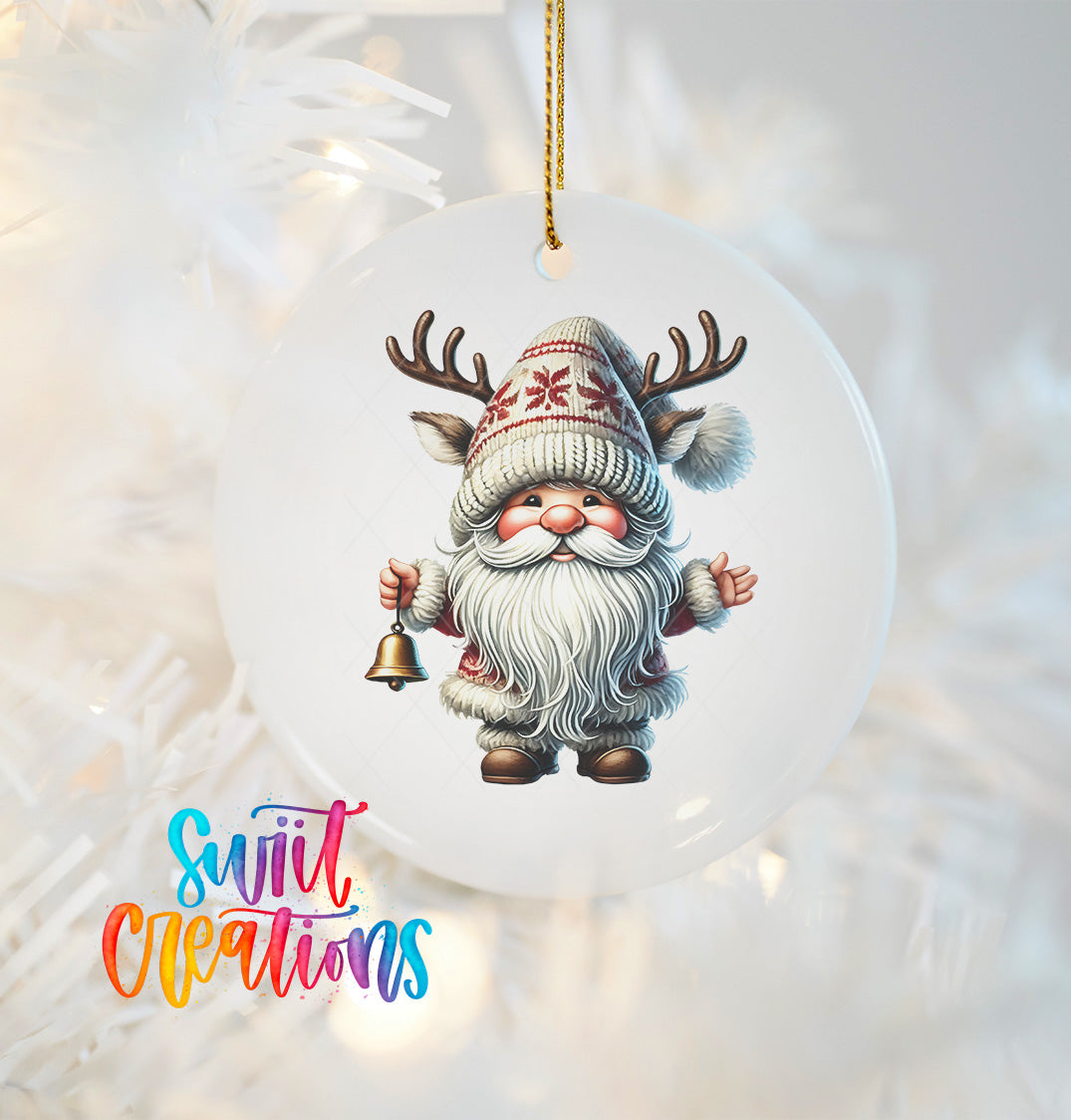 A white ornament featuring a smiling gnome with antlers, wearing a red and white striped hat and holding a bell.