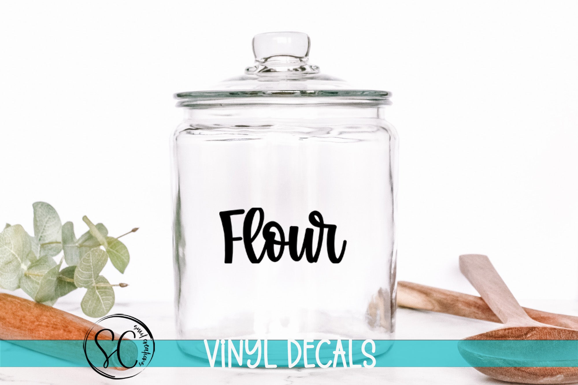 a glass jar with the word flour written on it