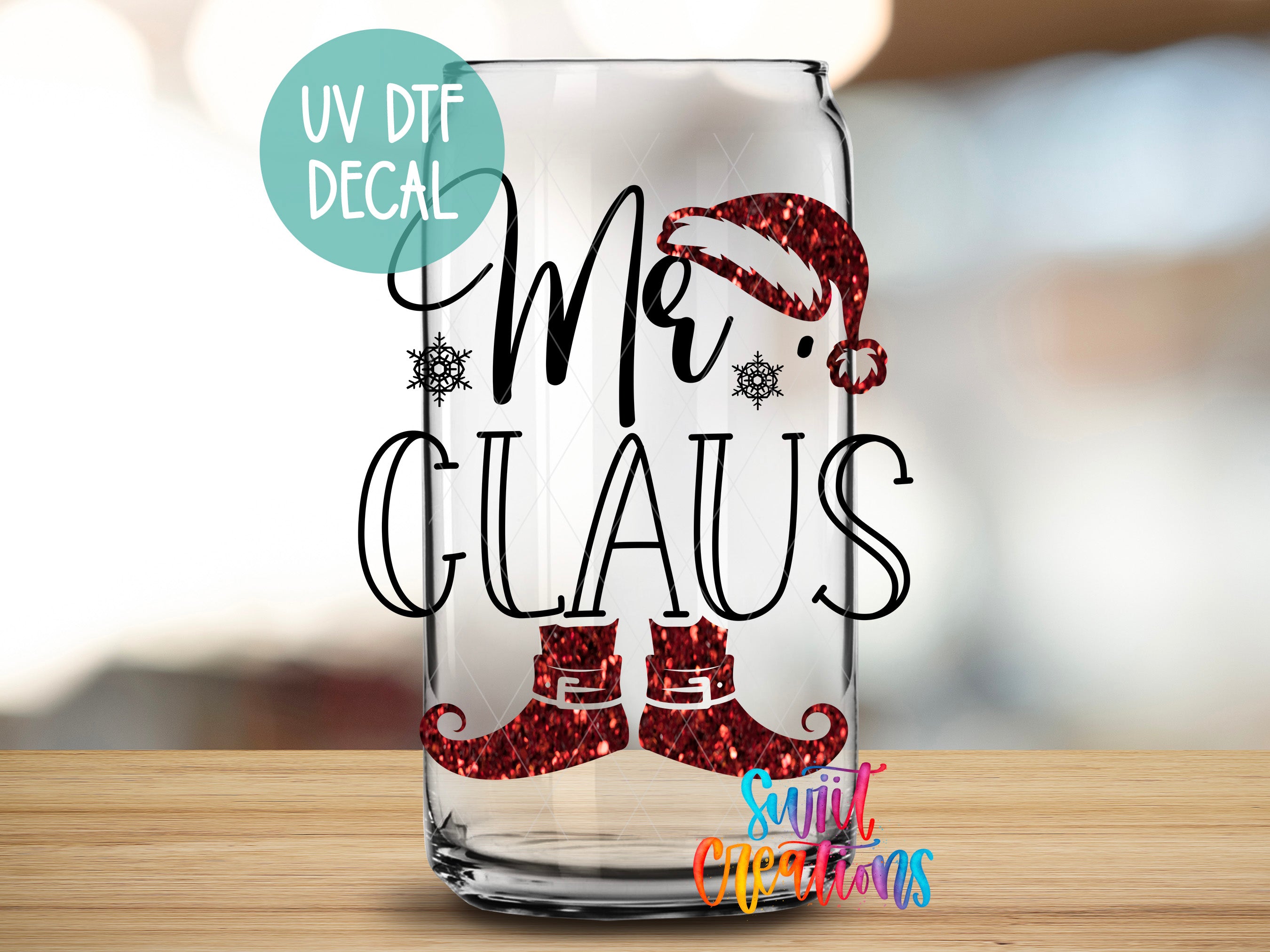 a glass with a santa hat on it