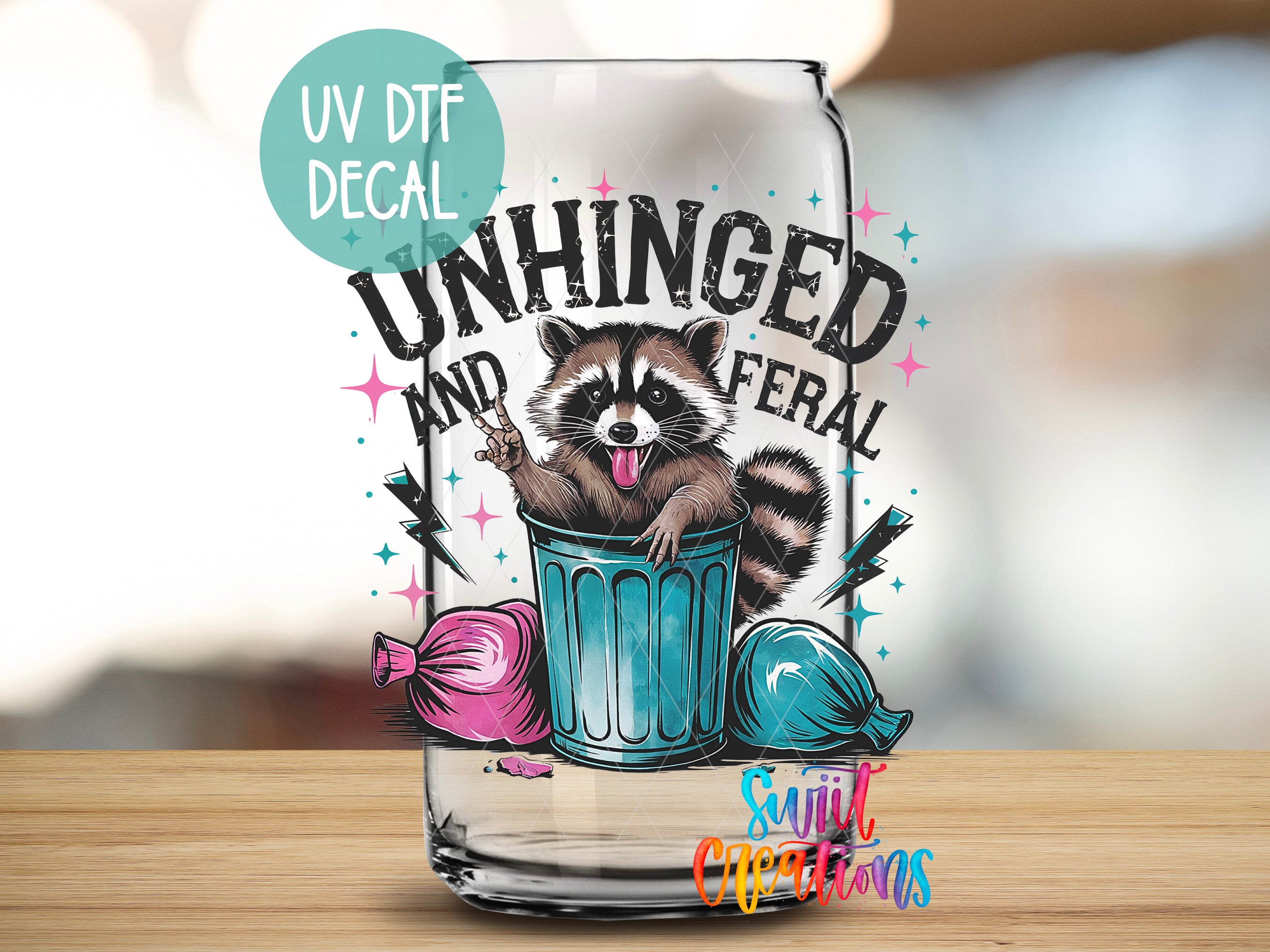 a glass with a raccoon sticking its tongue out