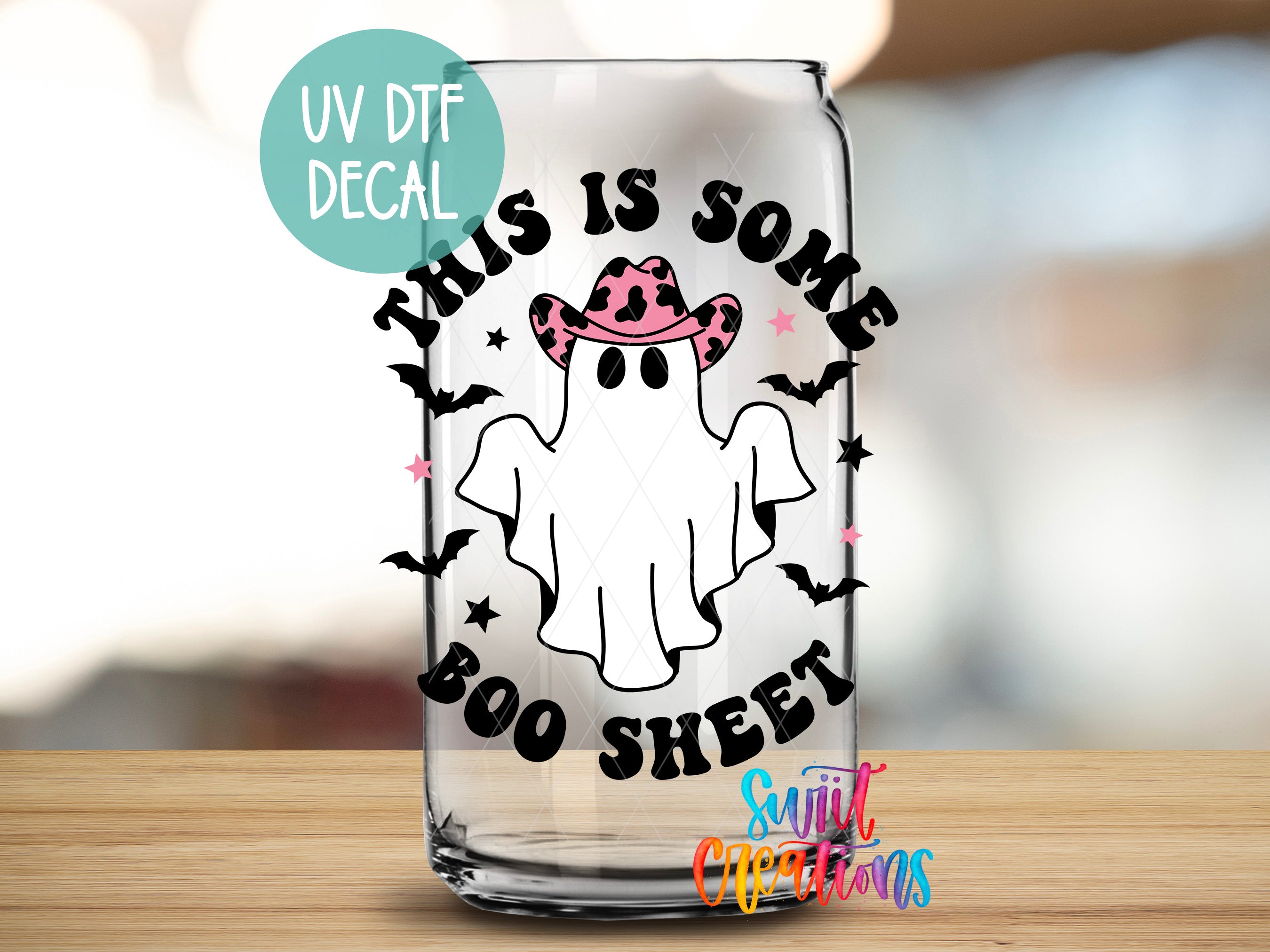a glass with a picture of a ghost on it