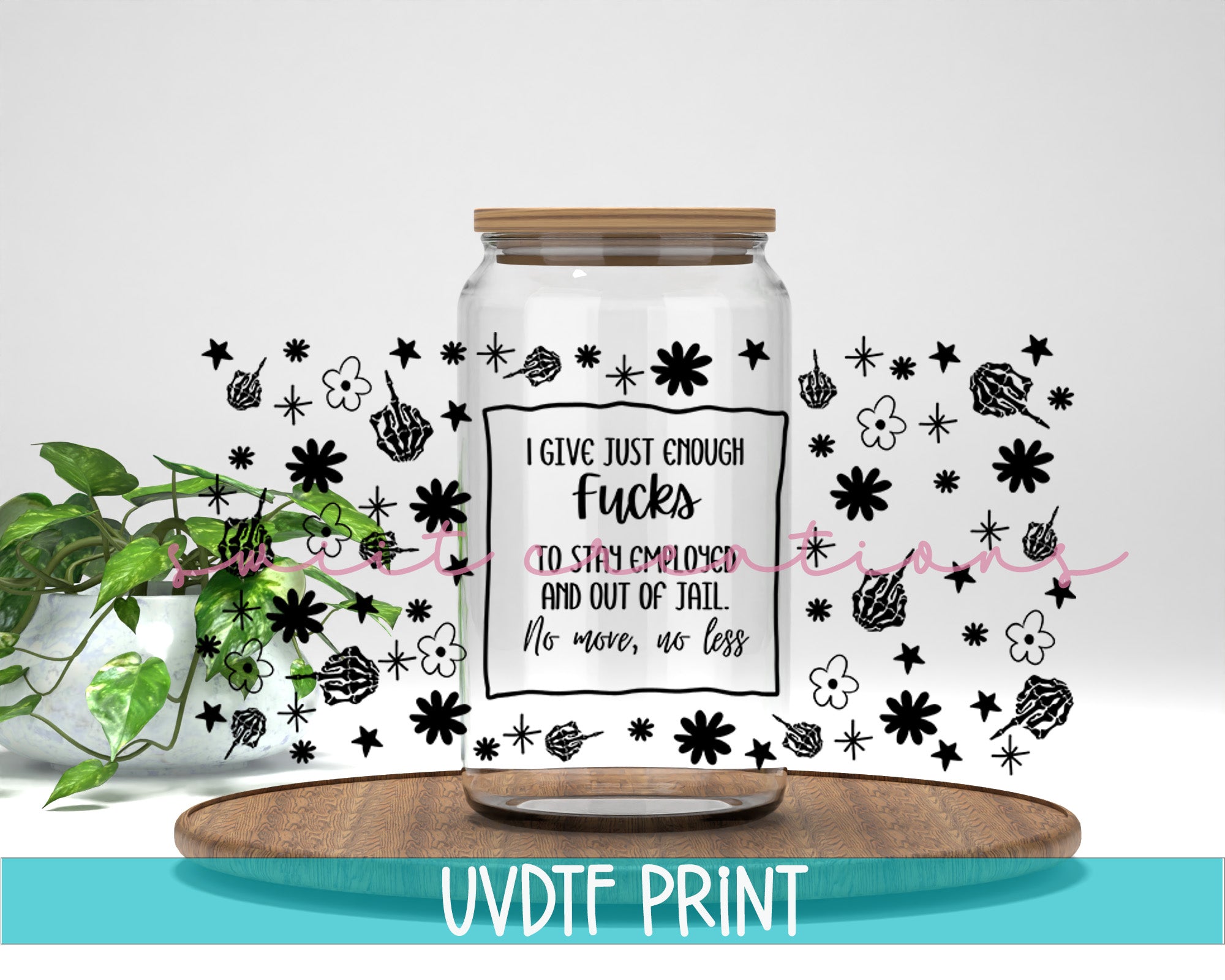 a glass jar filled with flowers on top of a table