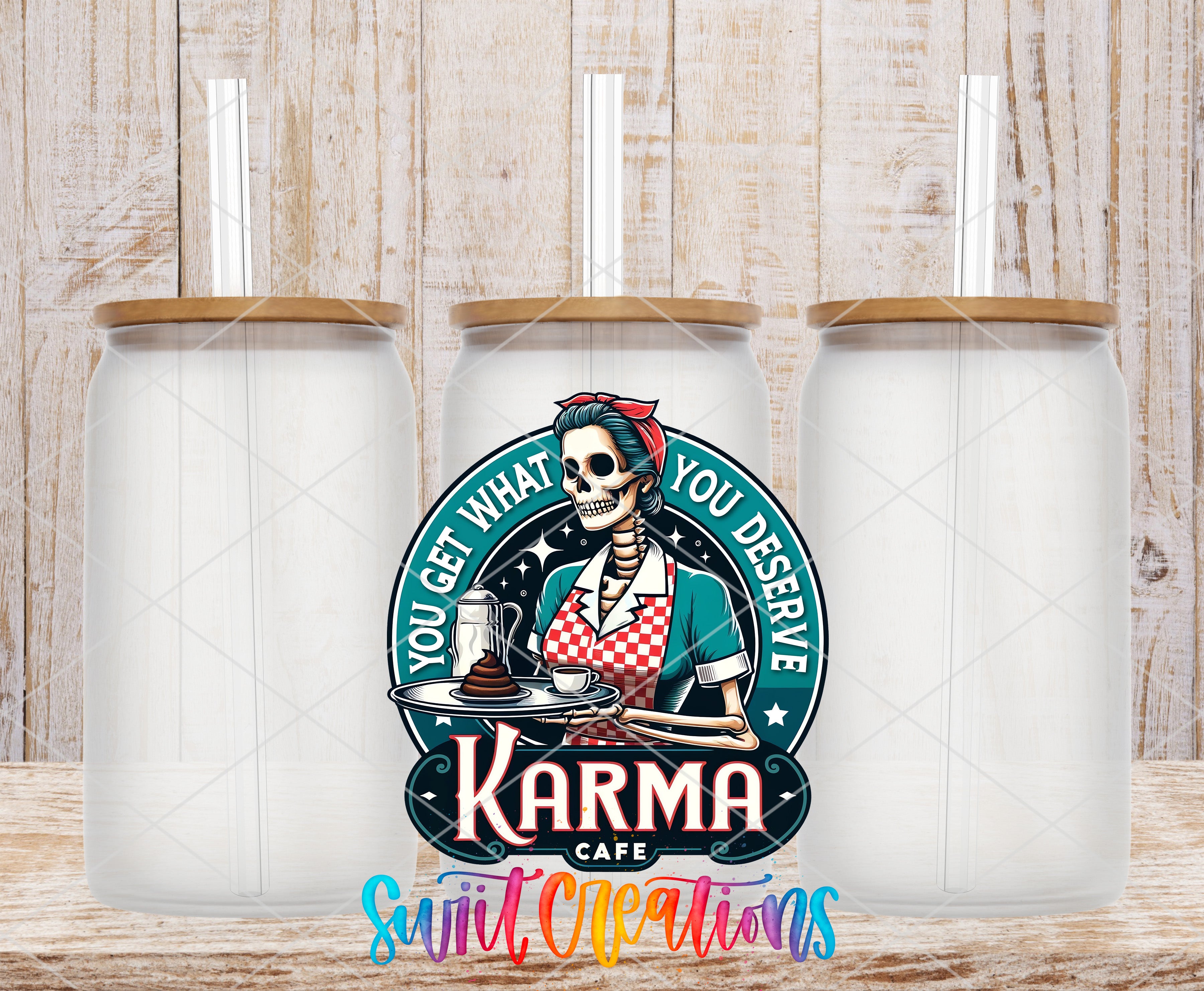 Swiit Creations UV DTF You Get What You Deserve Karma Cafe transfer shown on a clear glass can set