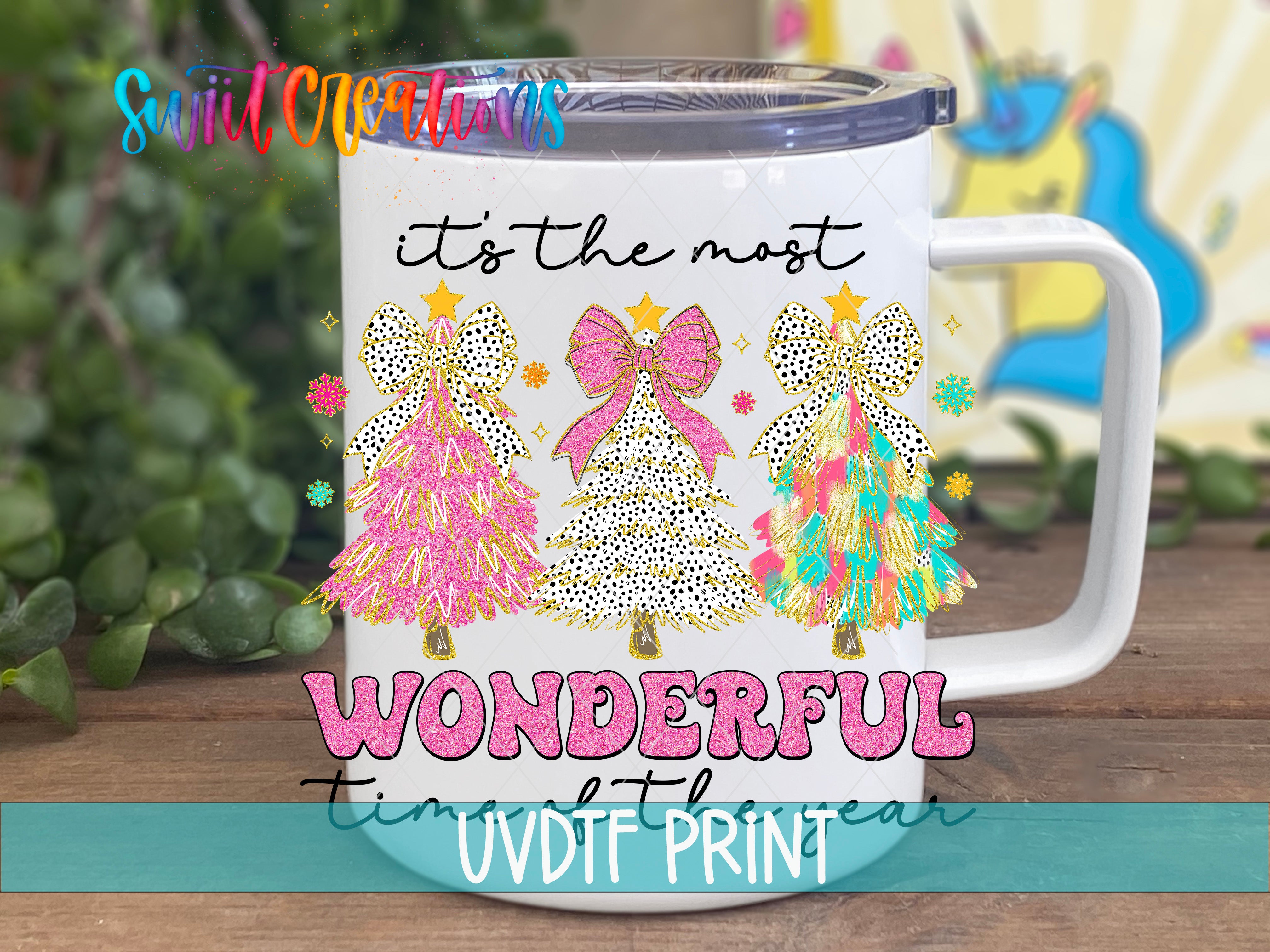 a white coffee mug with a pink bow on it