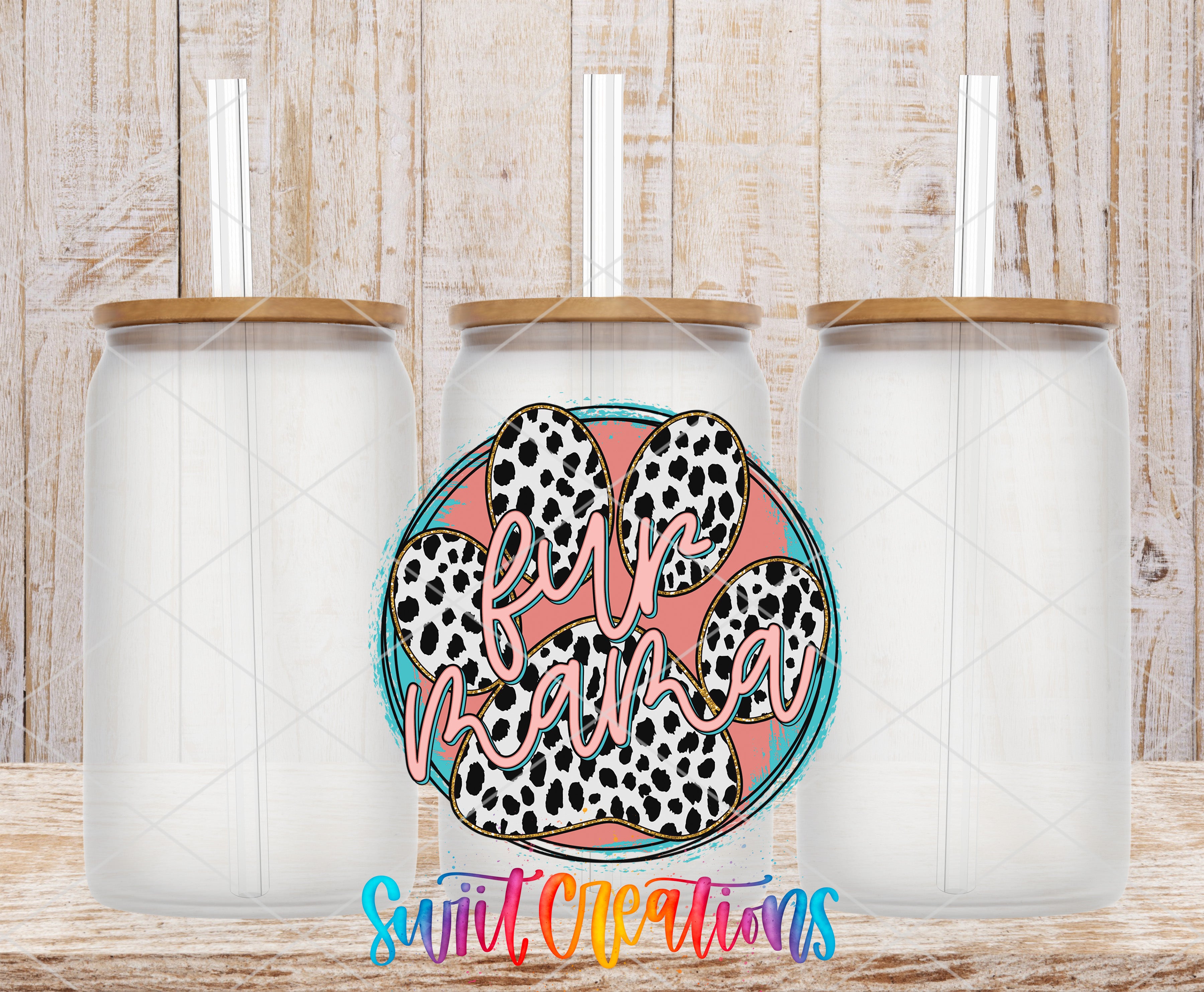 Swiit Creations UV DTF Paw Print Fur Mama transfer shown on a clear glass can set