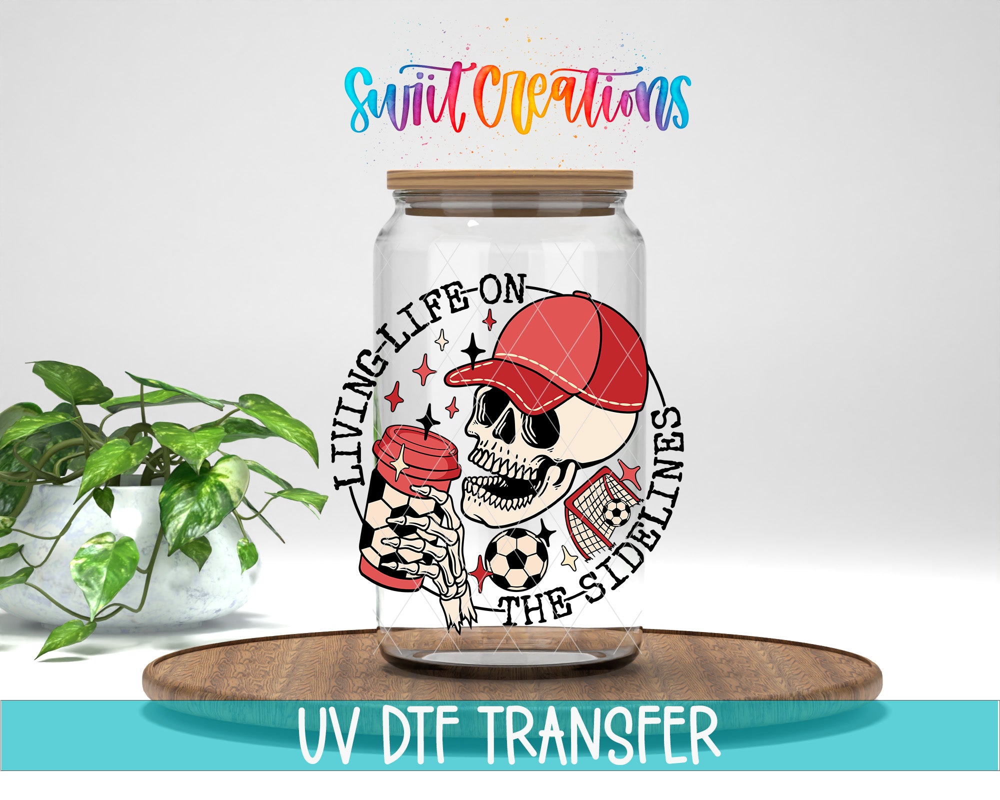 a glass jar with a skull and soccer ball design, along with the text "LIVING LIFE ON THE SIDELINES" and "SWIFT CREATIONS" written above it.