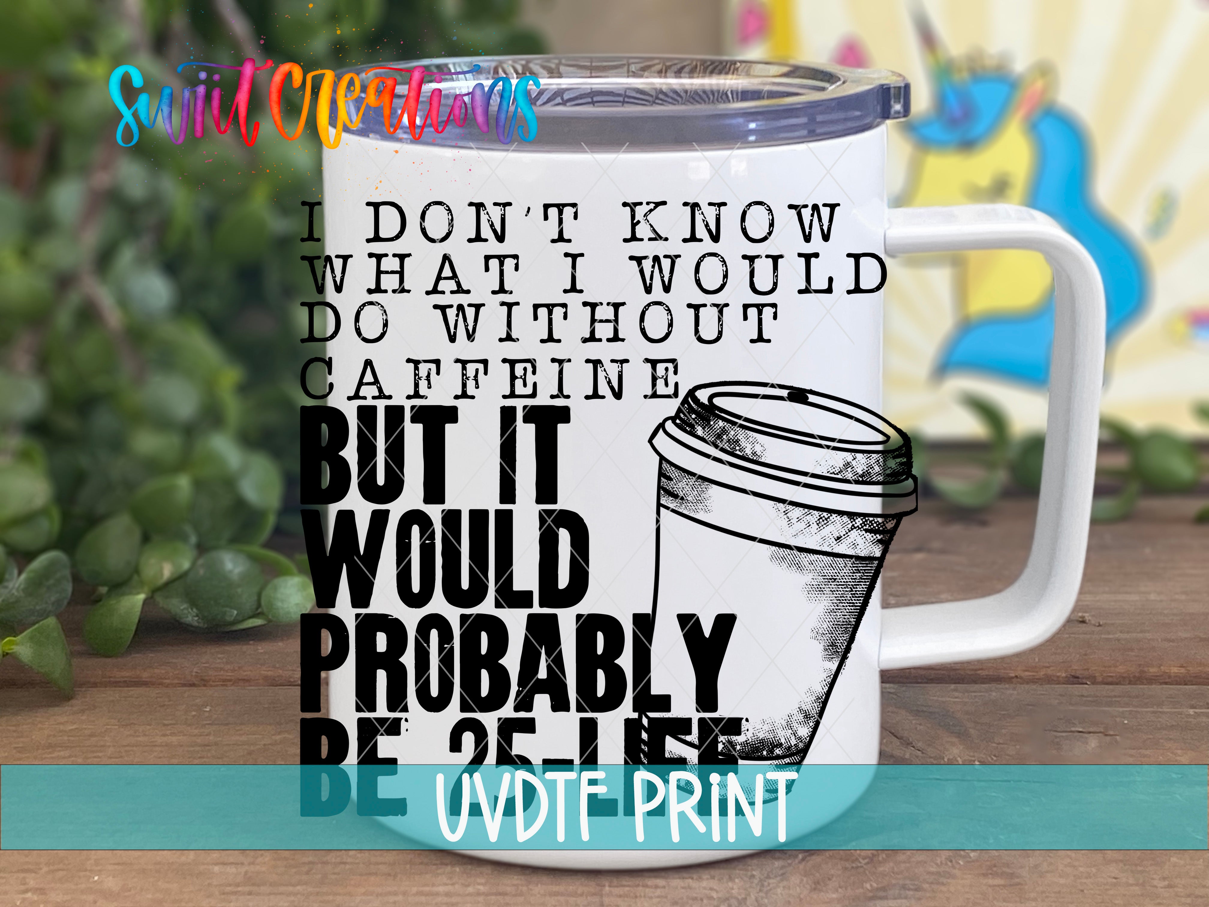 A white mug with a humorous text and graphic design printed on it, placed on a wooden surface with greenery in the background.