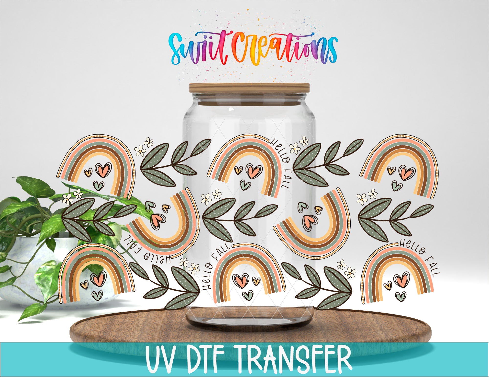 a glass jar with a lid, surrounded by a colorful array of rainbow-colored hearts and leaves. The jar is placed on a wooden surface, and there is a potted plant nearby. The image also includes text that reads "UV DFT Transfer" and "Swift Creations".
