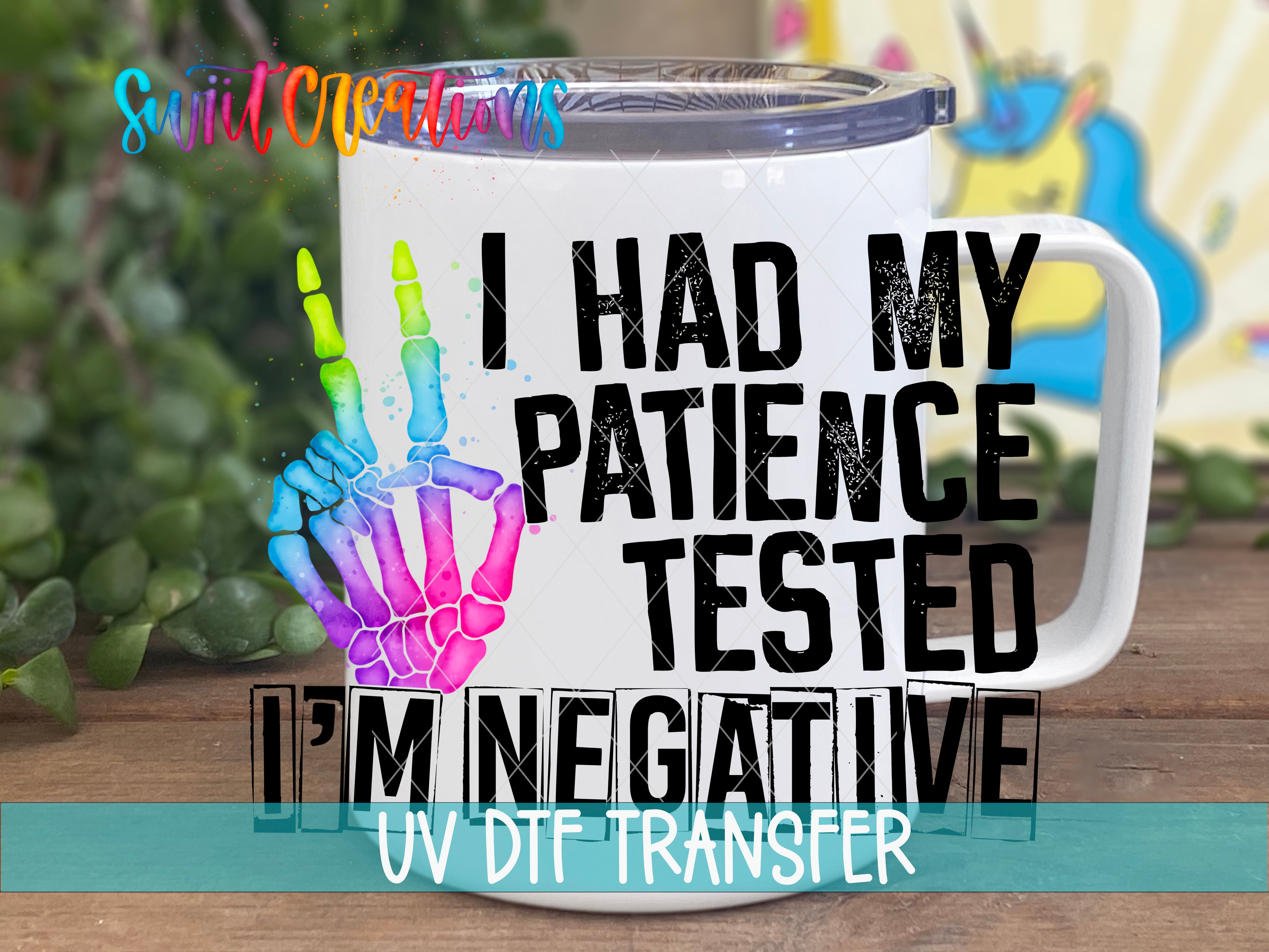 Swiit Creations I Had My Patience Tested—I’m Negative UV DTF transfer displayed on a white coffee mug