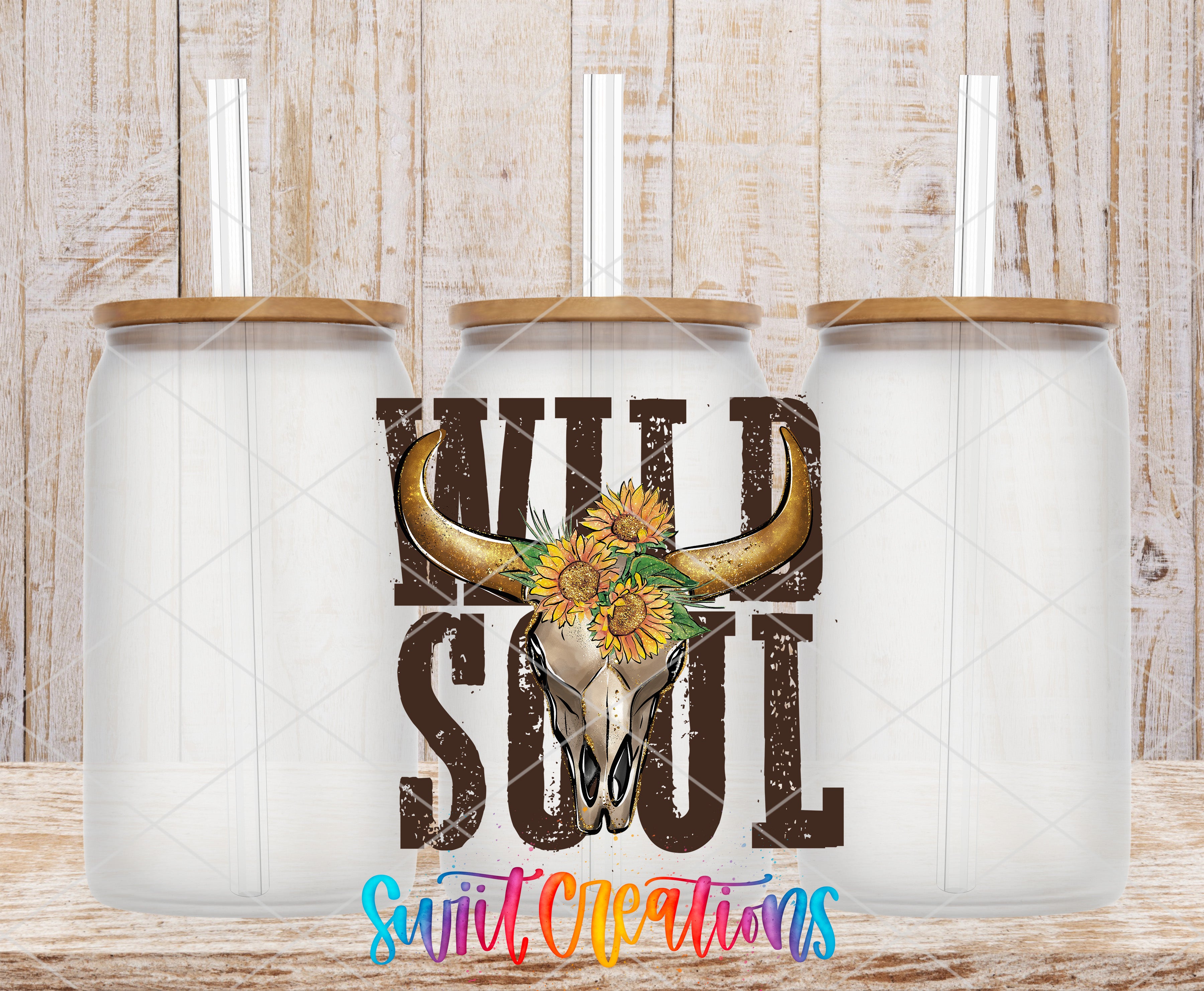 Swiit Creations UV DTF Wild Soul Country transfer shown on a clear glass can set