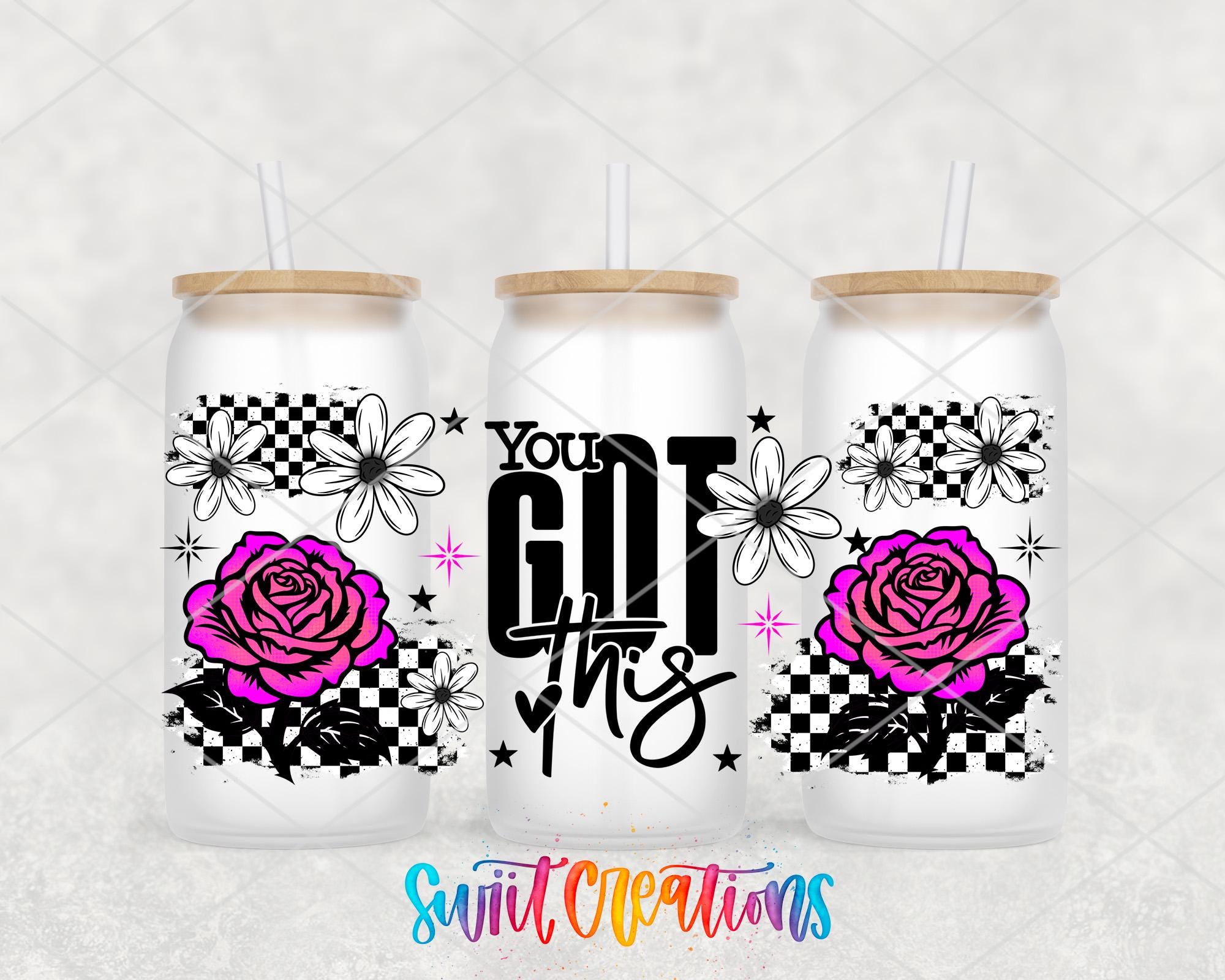 three white tumblers with black and pink floral designs and the text "You Got This" printed on them.