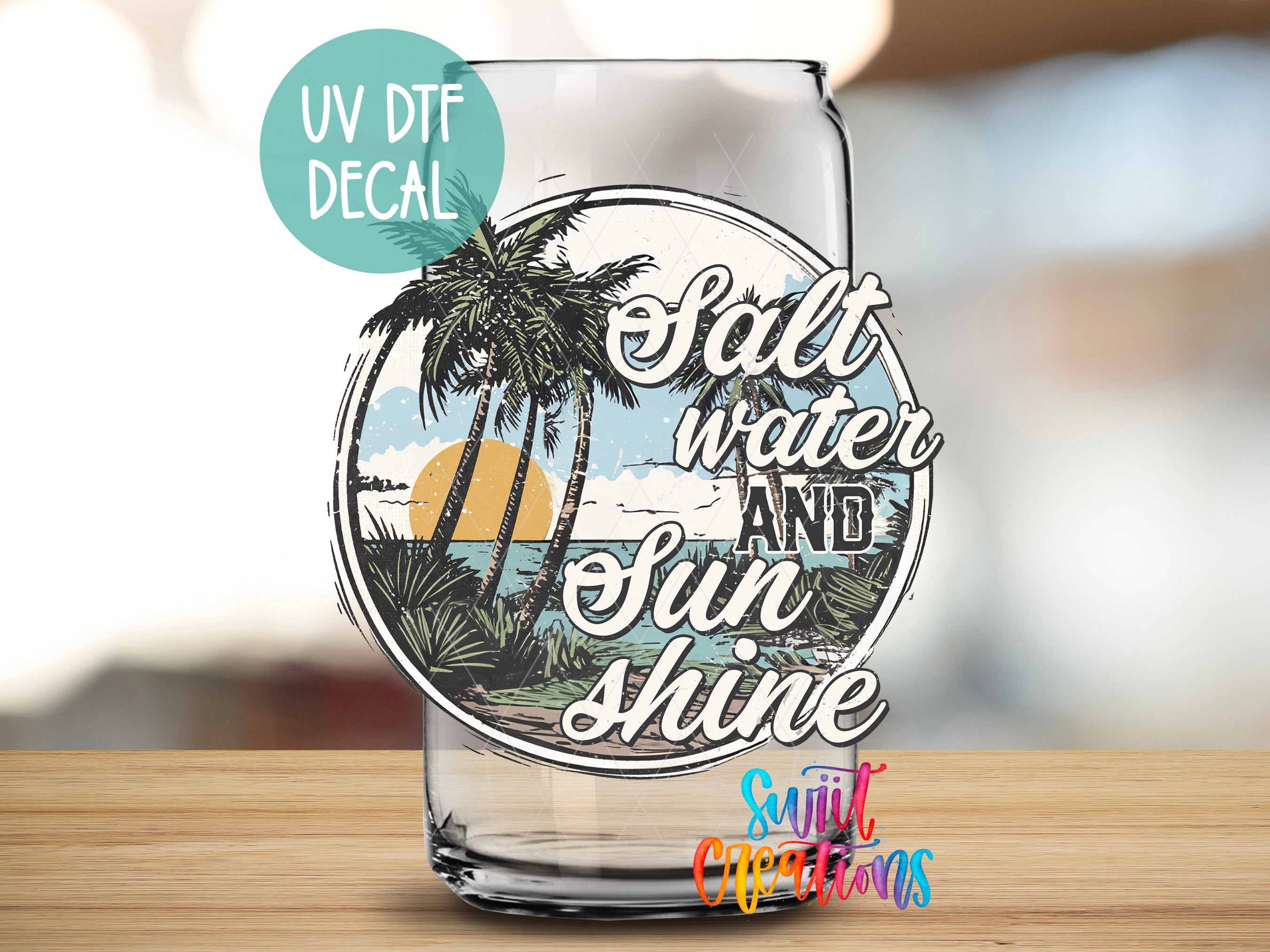 a glass with a picture of palm trees and the words salt water and sun shine