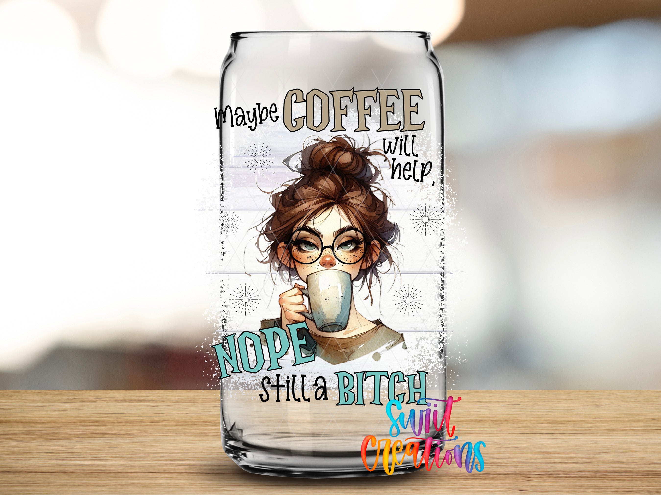A glass can with a cartoon illustration of a woman holding a coffee mug, along with text that says "MAYBE COFFEE will help", "NOPE STILL A BITCH", and "SUNT CELEBRATIONS".