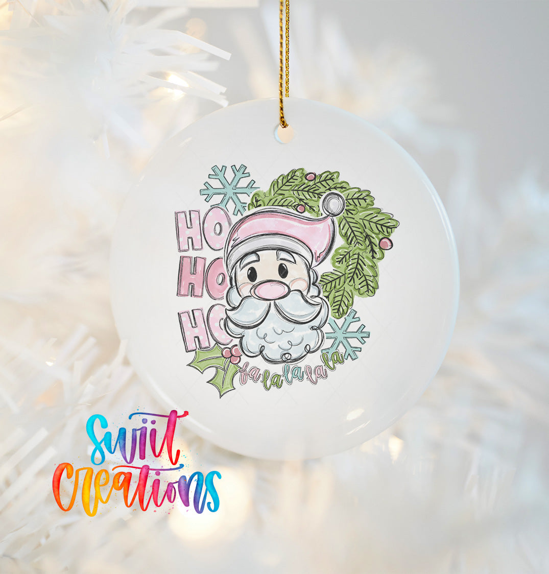A white ornament with a Santa Claus face and the text "HOOK HOOK HOOK" hanging on a string.