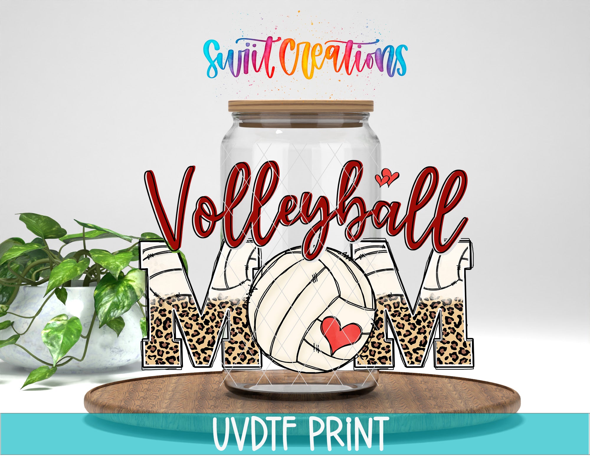 a glass jar with a leopard print design and the word "Volleyball" written on it, along with a heart symbol. The jar is placed on a wooden surface, and there is a plant in the background. The text "Swift Creations" is written above the jar, and "UVDDF PRINT" is written at the bottom of the image.